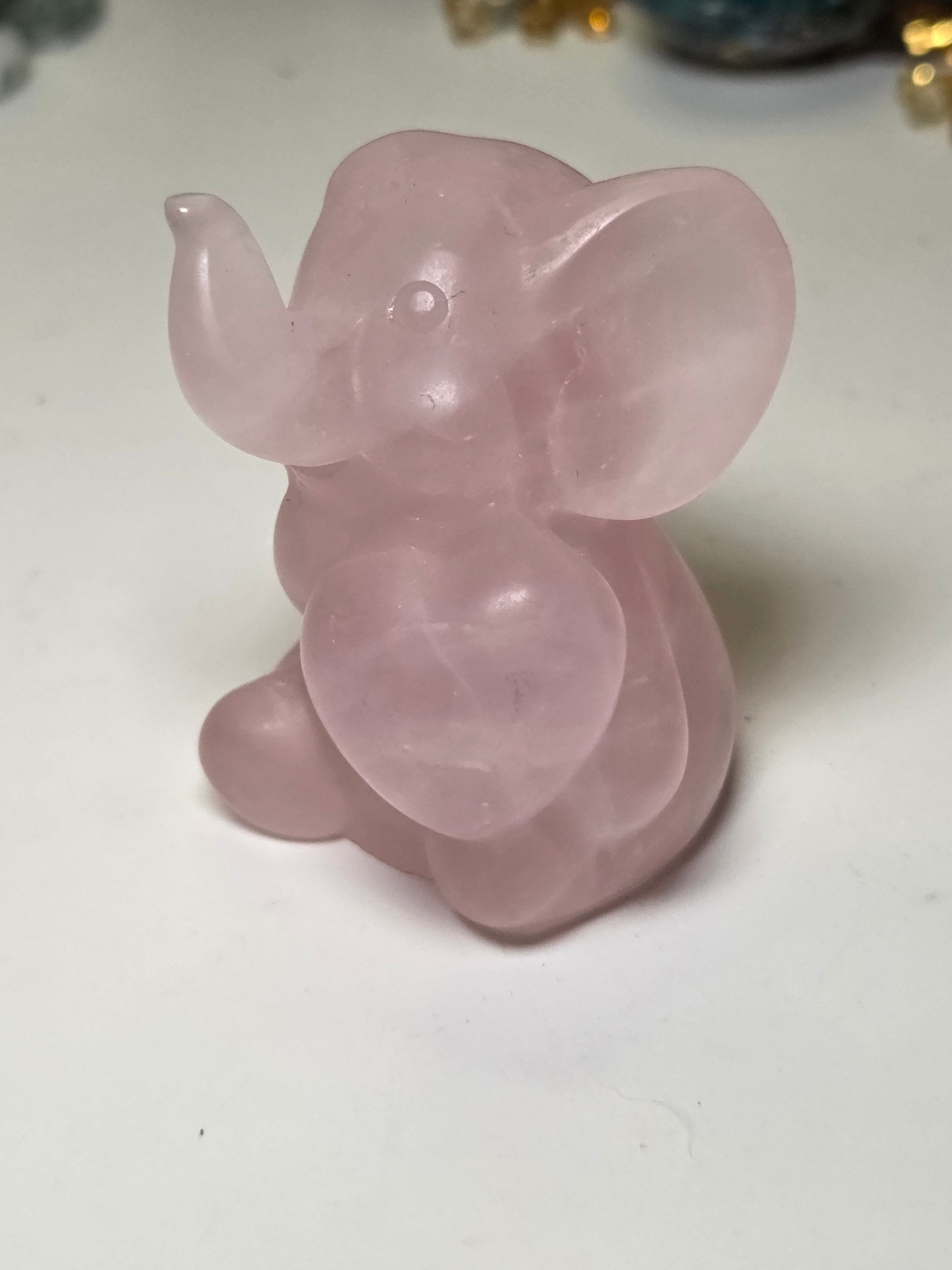 Rose quartz crystal Elephant carving with heart