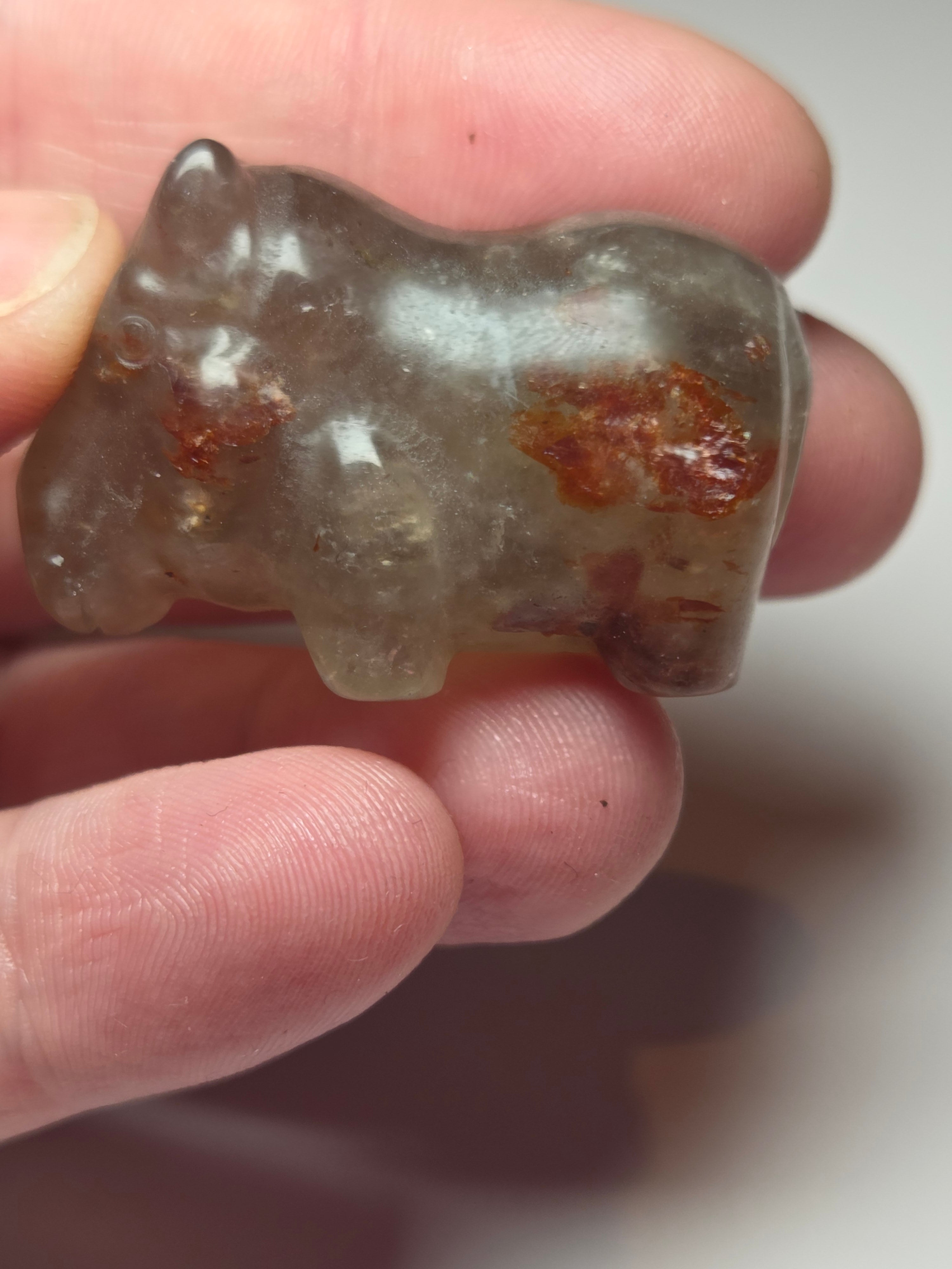 Fire quartz crystal hippo carving