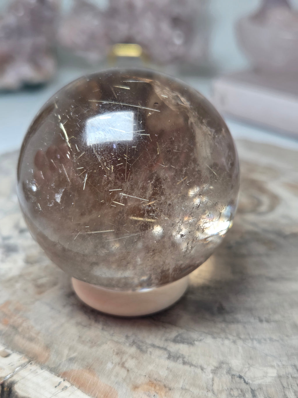 Golden rutile crystal sphere