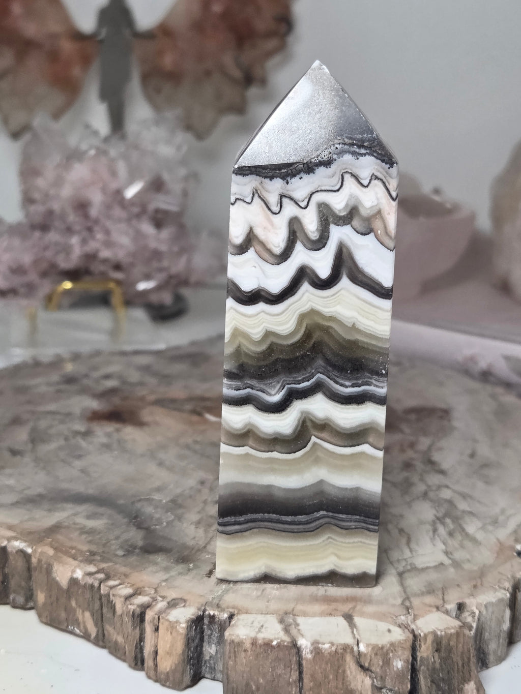 Orange calcite crystal tower