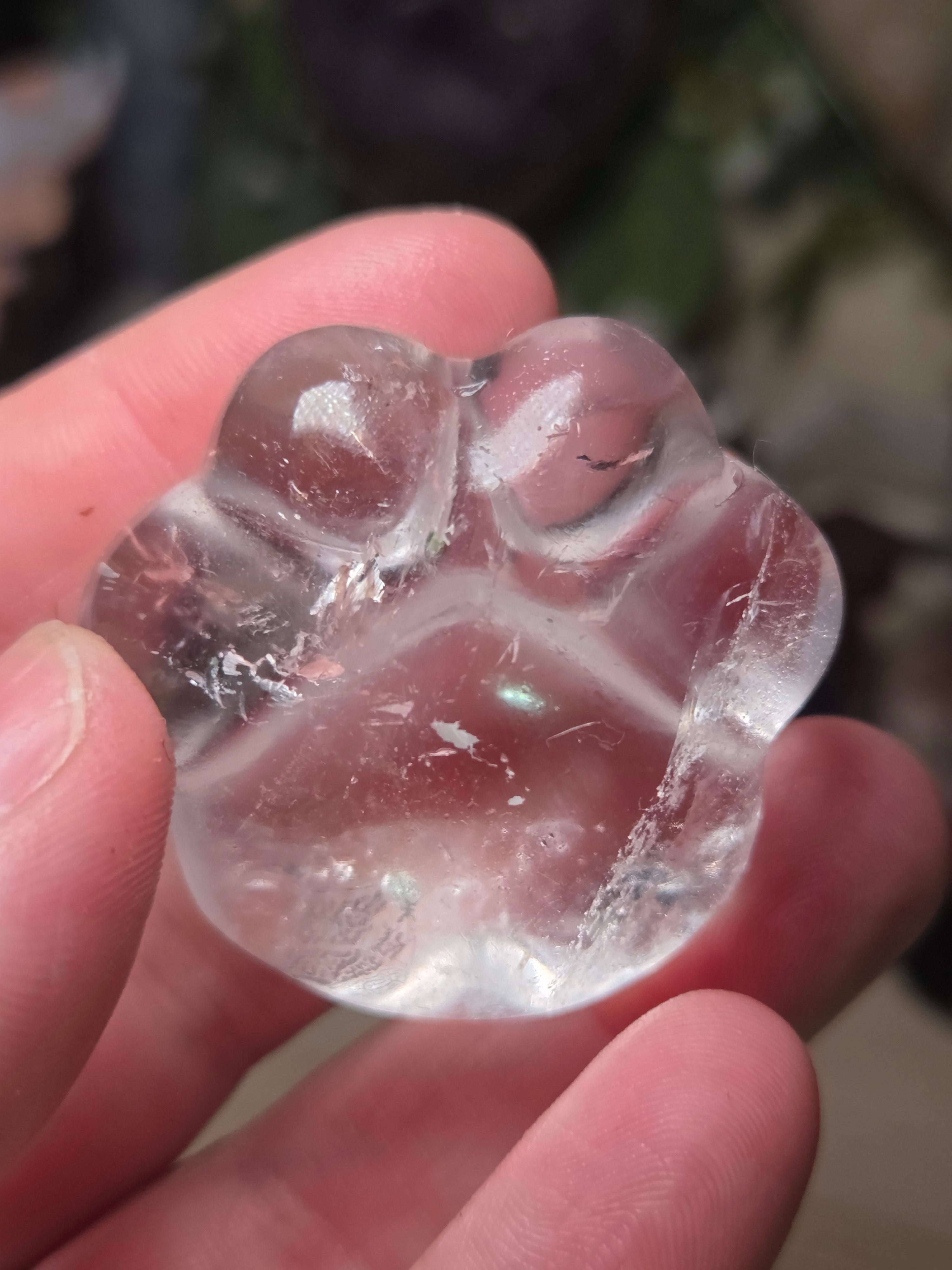 Clear quartz crystal paw print carving