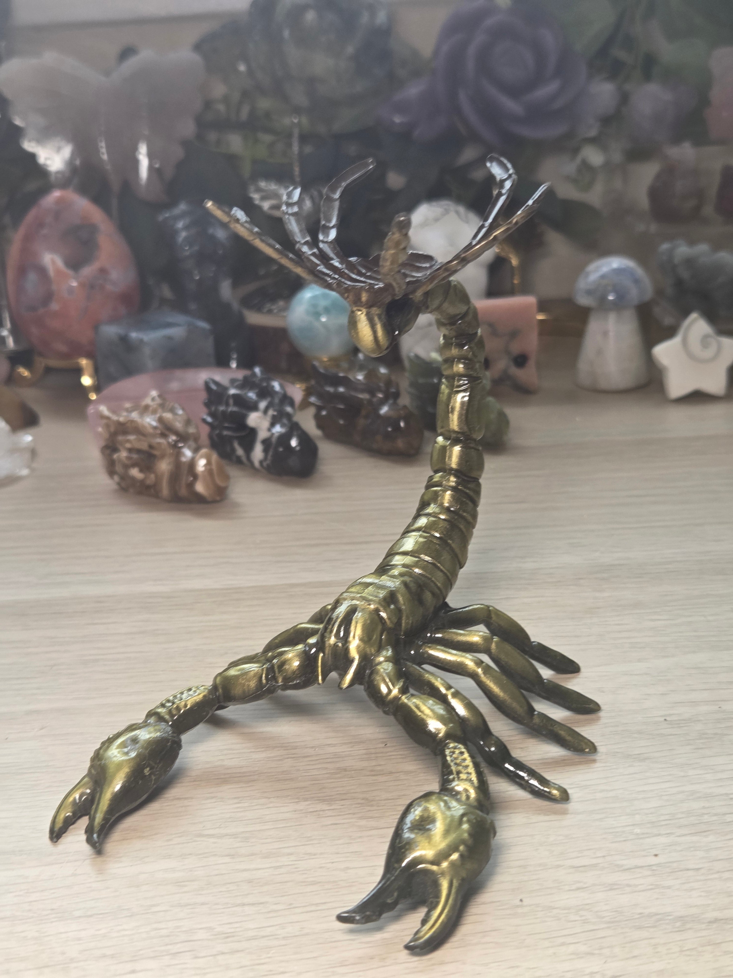 Golden scorpion sphere stand
