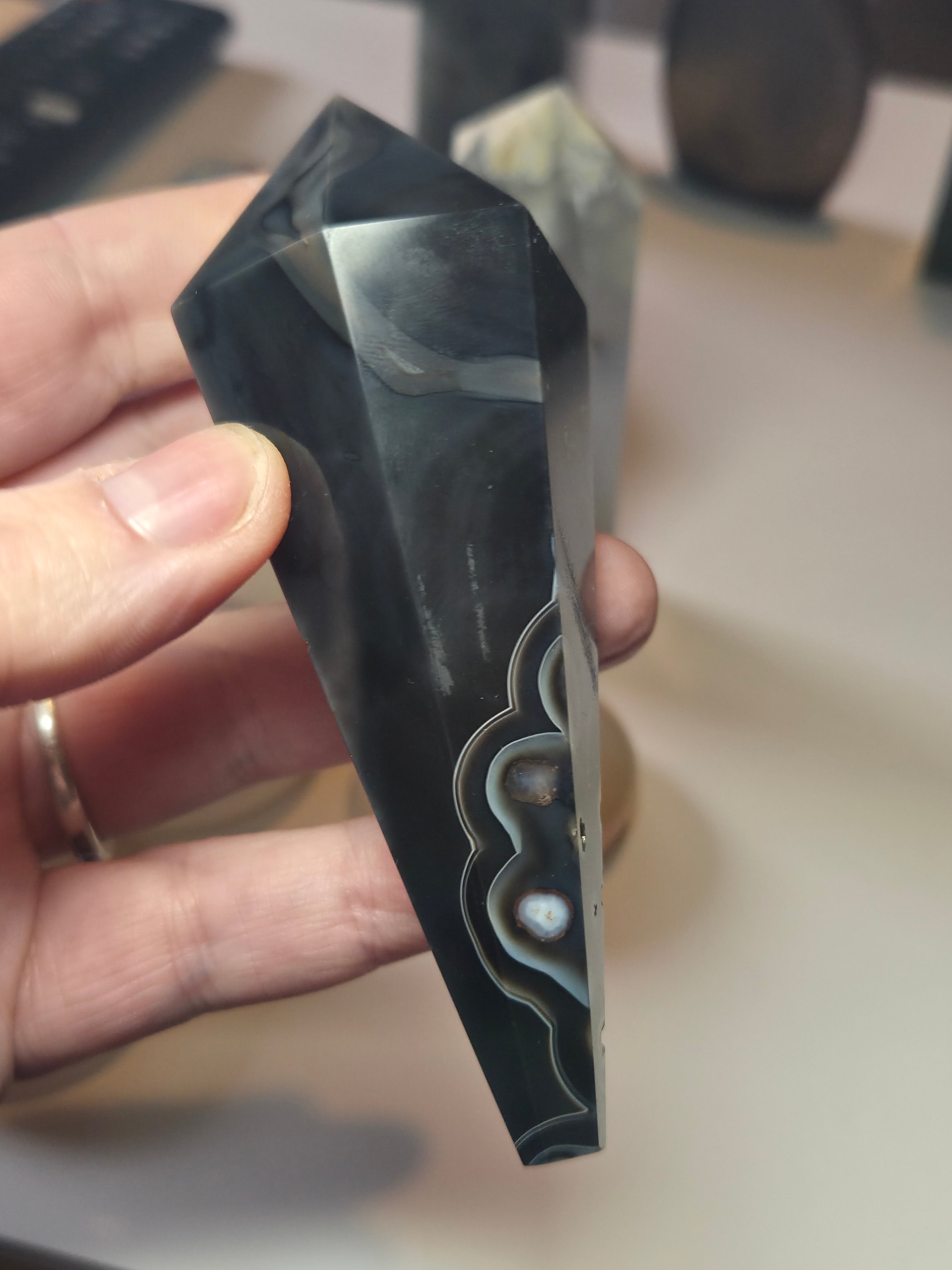 Sardonyx crystal wand with stand may have imperfections