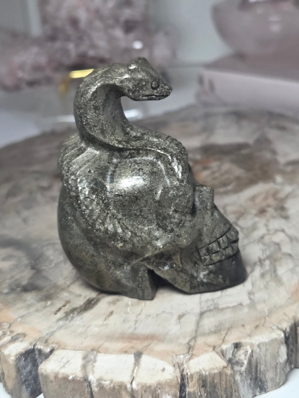 Pyrite crystal skull with Snake carving