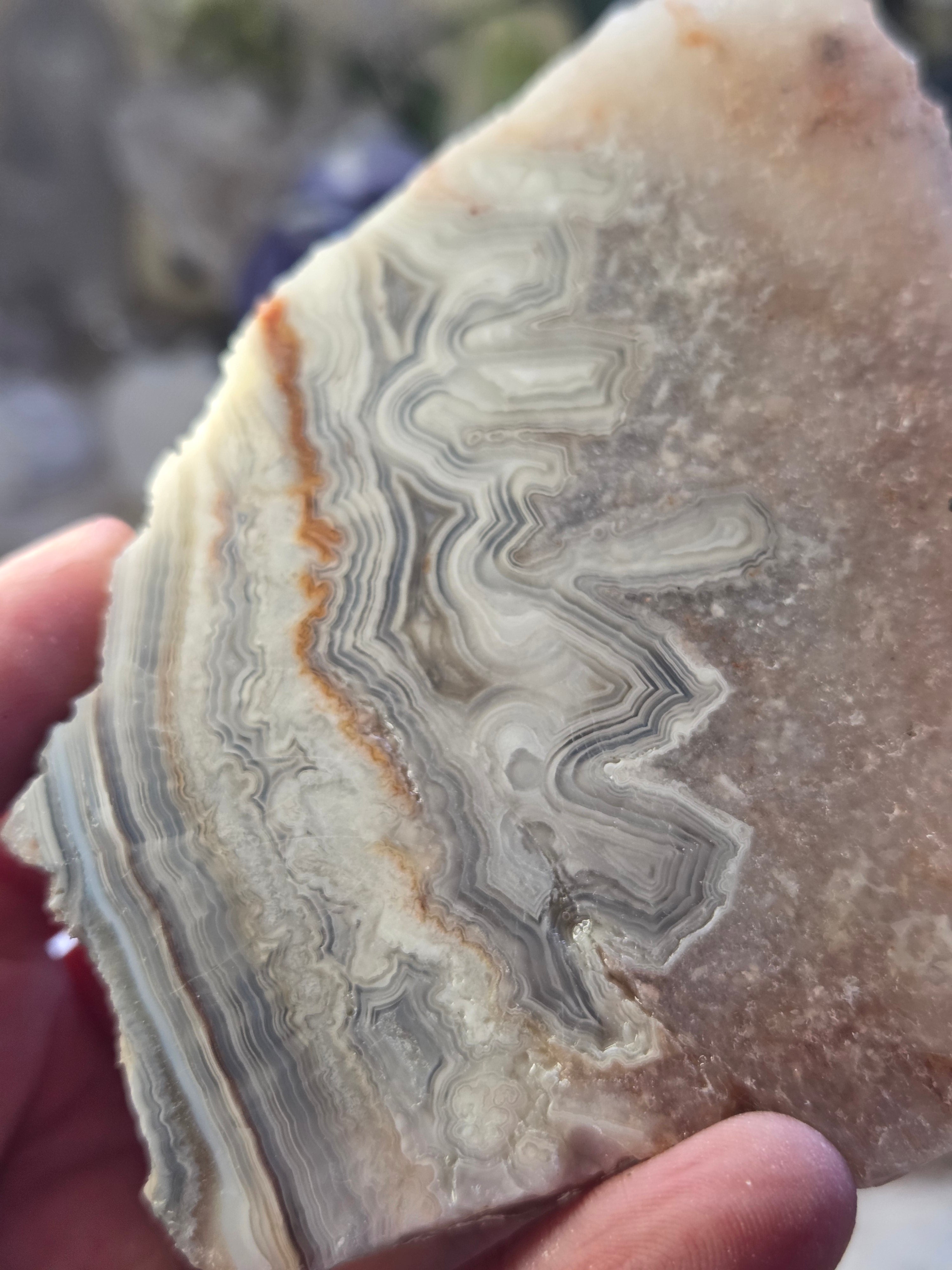 Crazy lace agate crystal slice  with pink amethyst