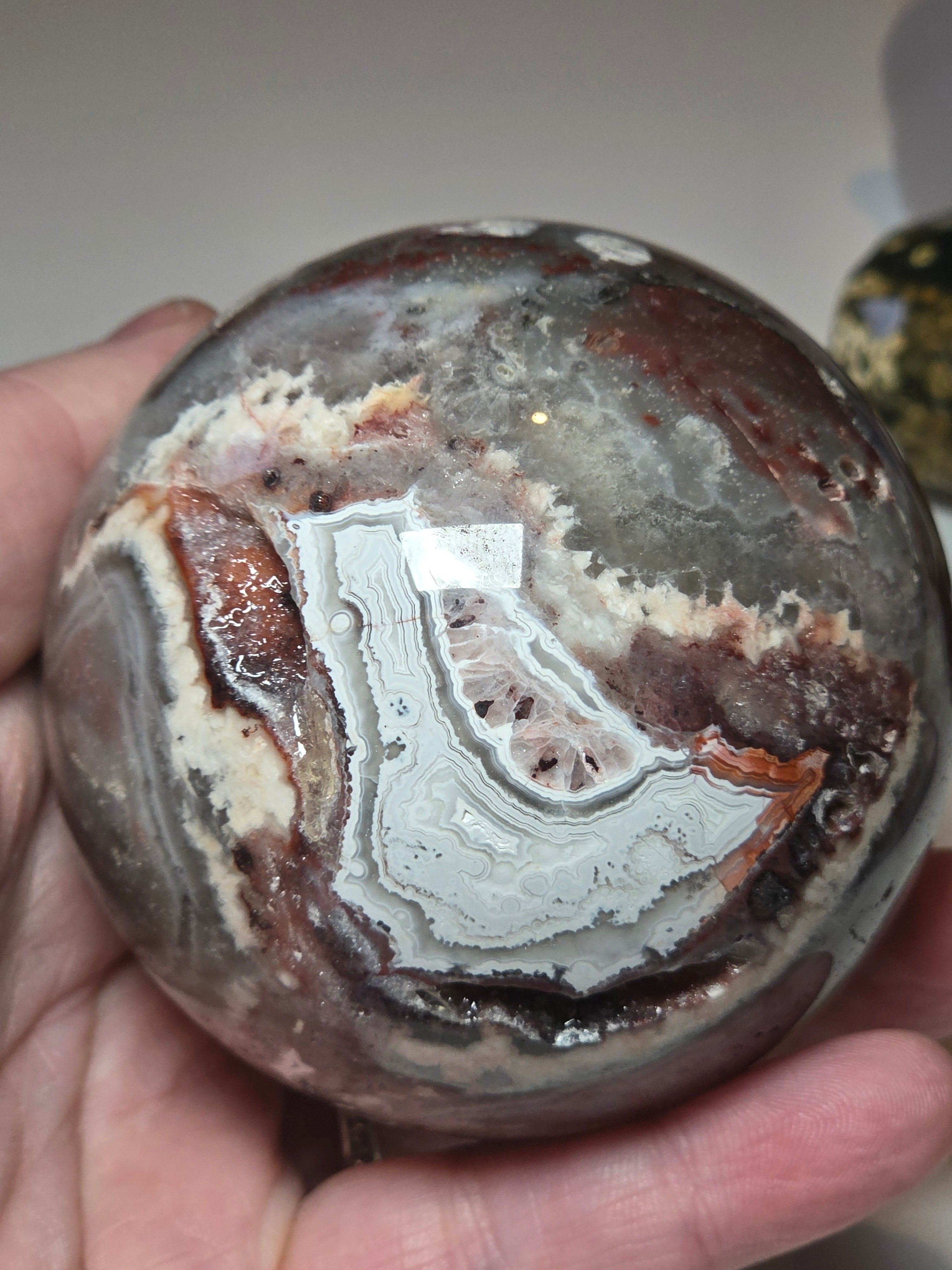 Mexican crazy lace agate crystal sphere  with imperfections