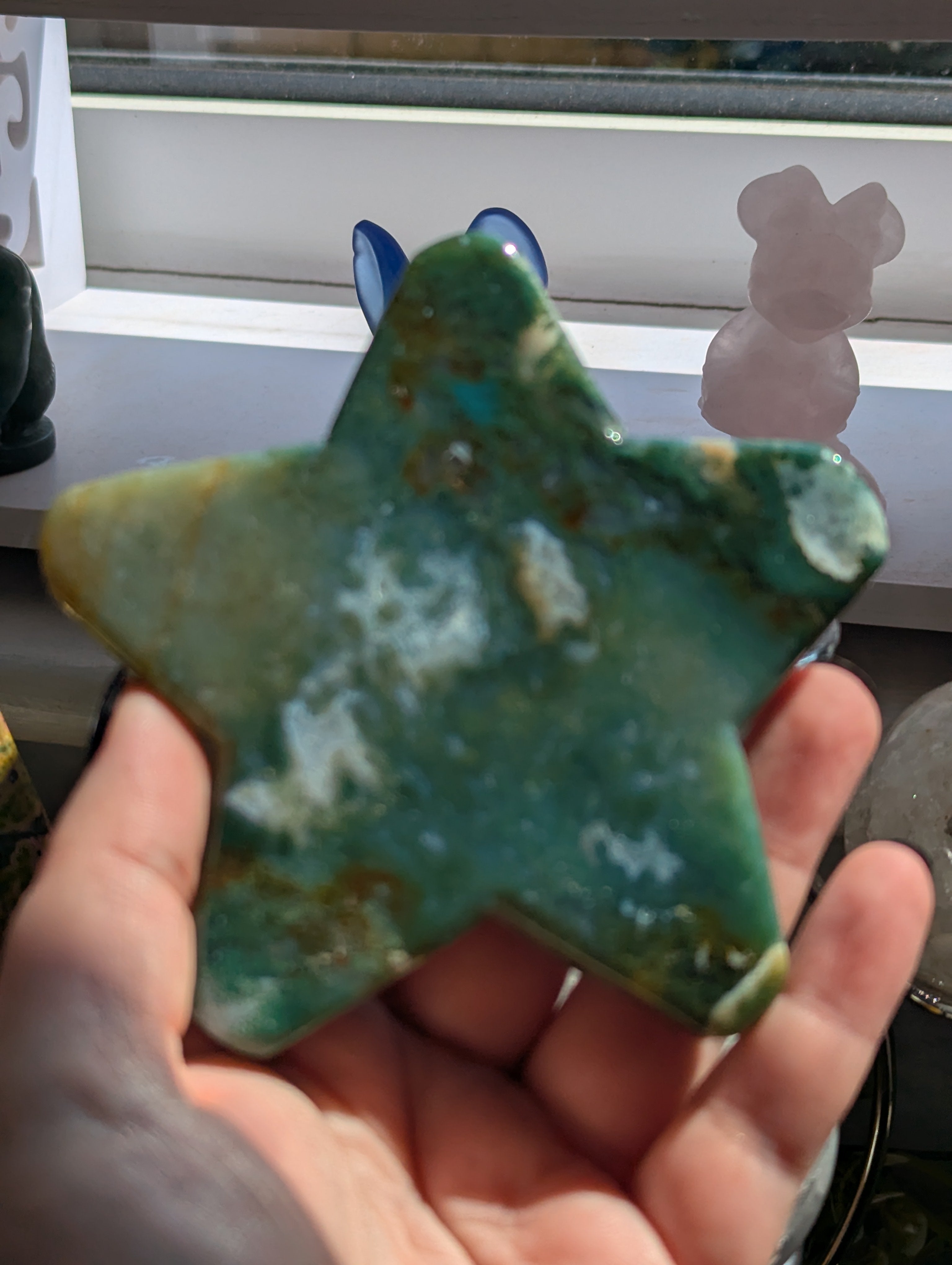 Moss agate crystal star with stand