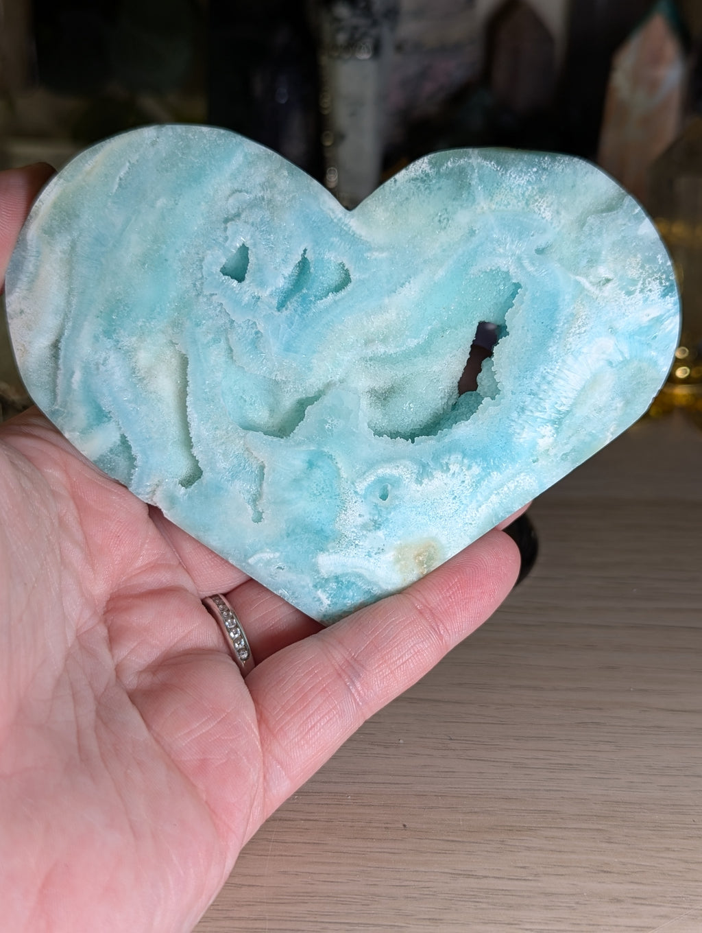 Hemimorphite crystal heart carving with stand
