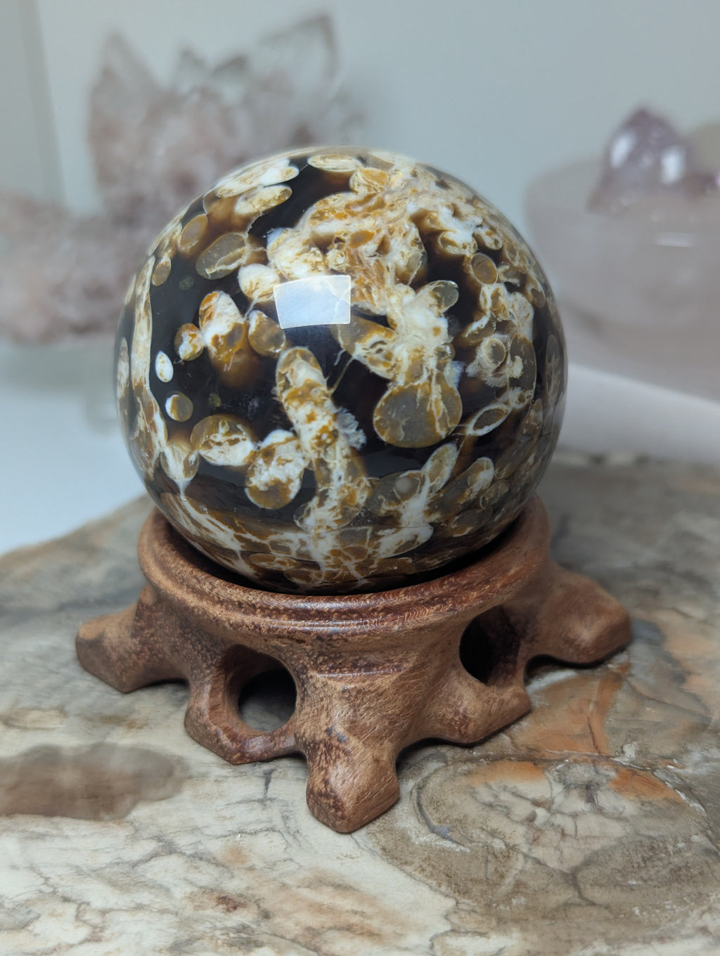 Natural Amber with calcite crystal sphere