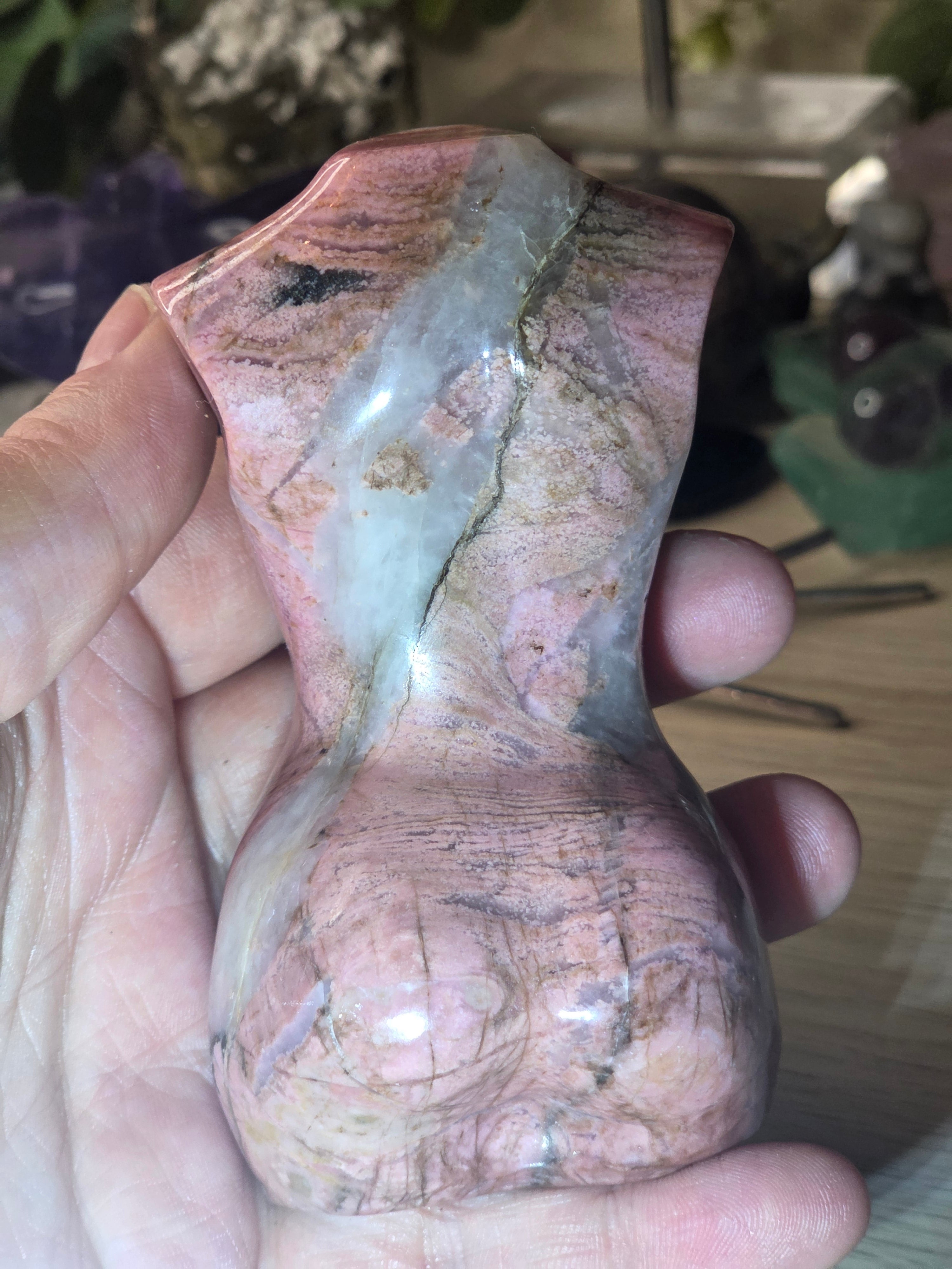 Rhodonite crystal female body carving