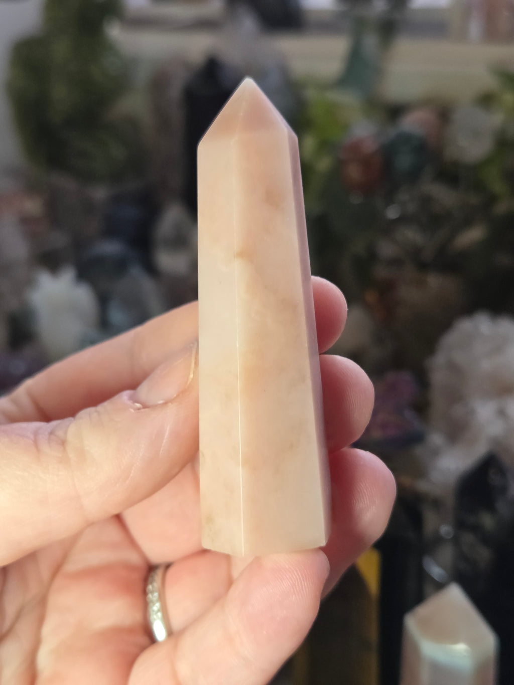 Pink opal crystal tower carving