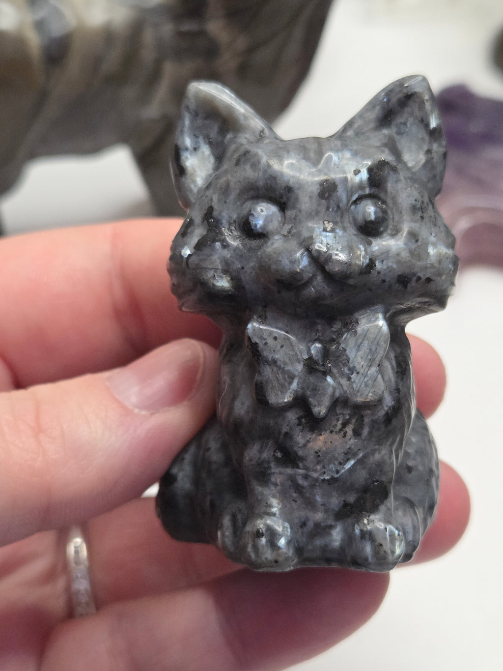 Larvakite crystal cat with  bow carving