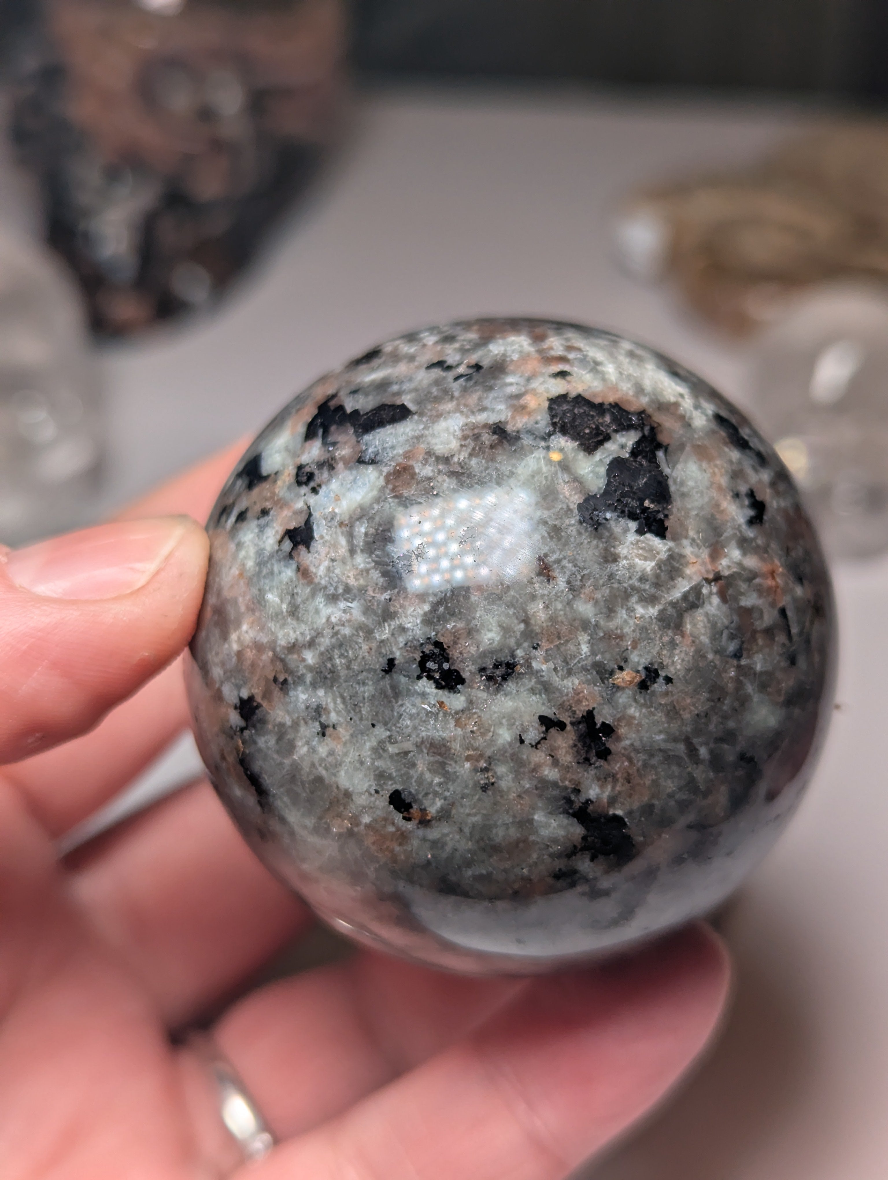 Yooperlite crystal sphere with Orange UV