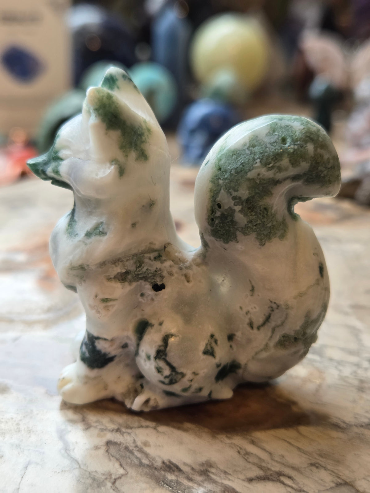 Moss agate crystal fox carving