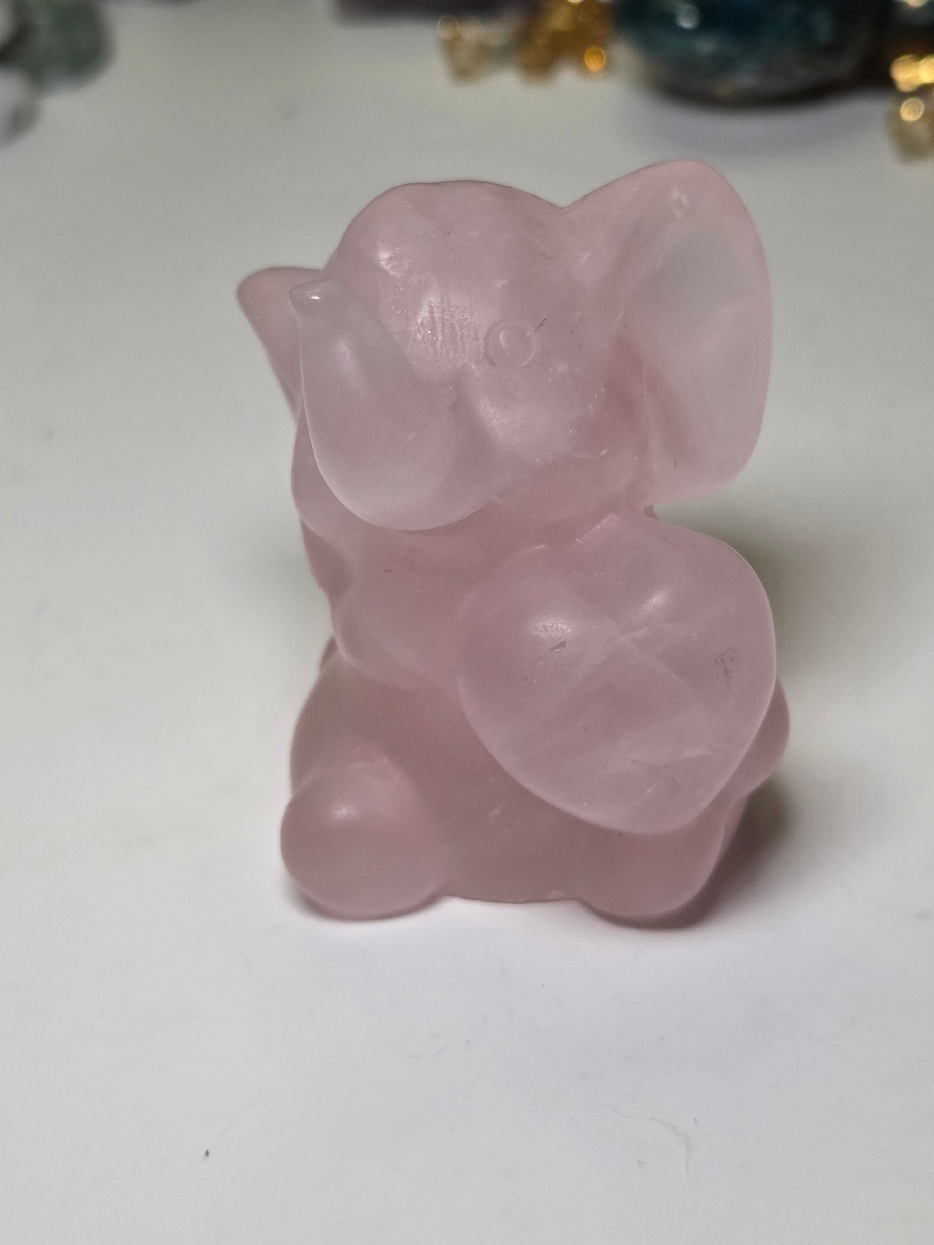 Rose quartz crystal Elephant carving with heart