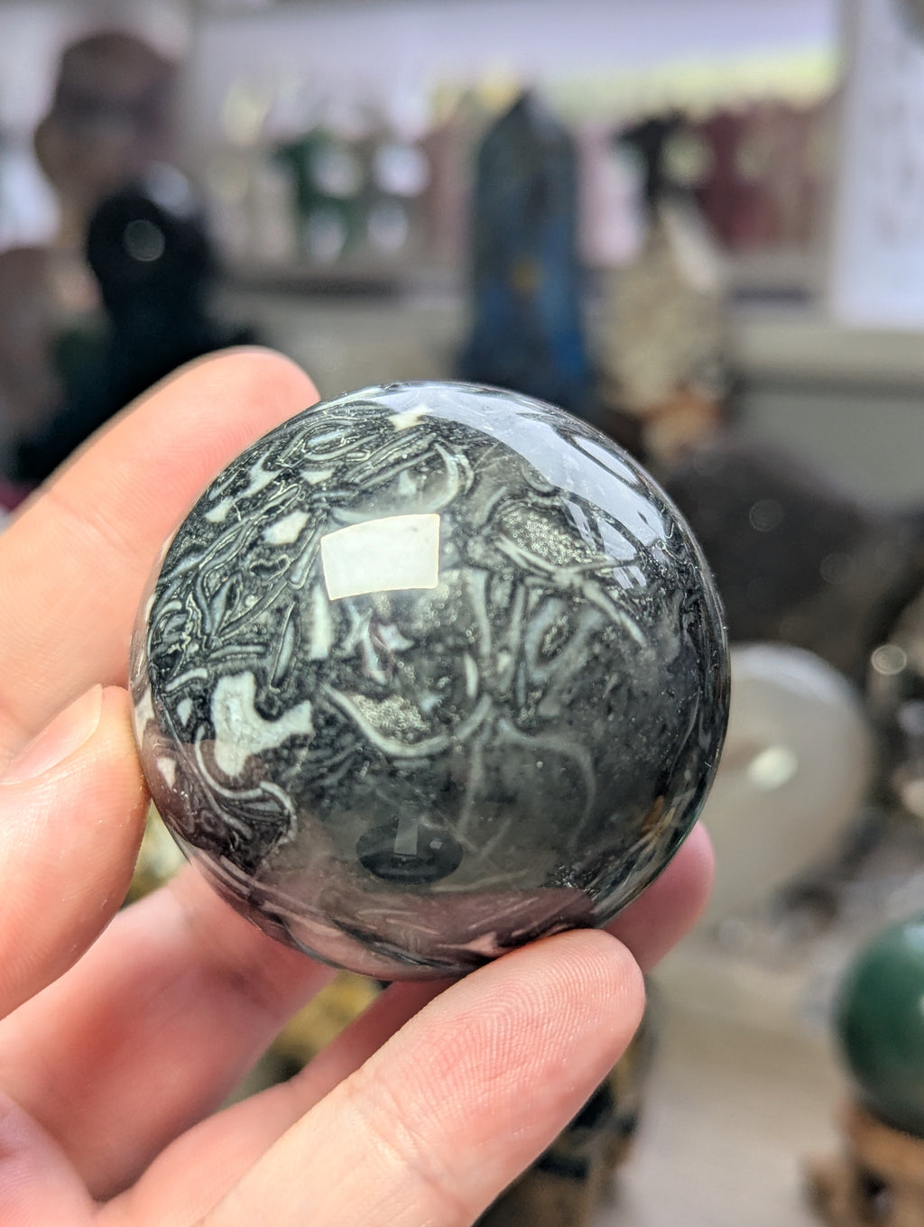 Fossil stone crystal sphere
