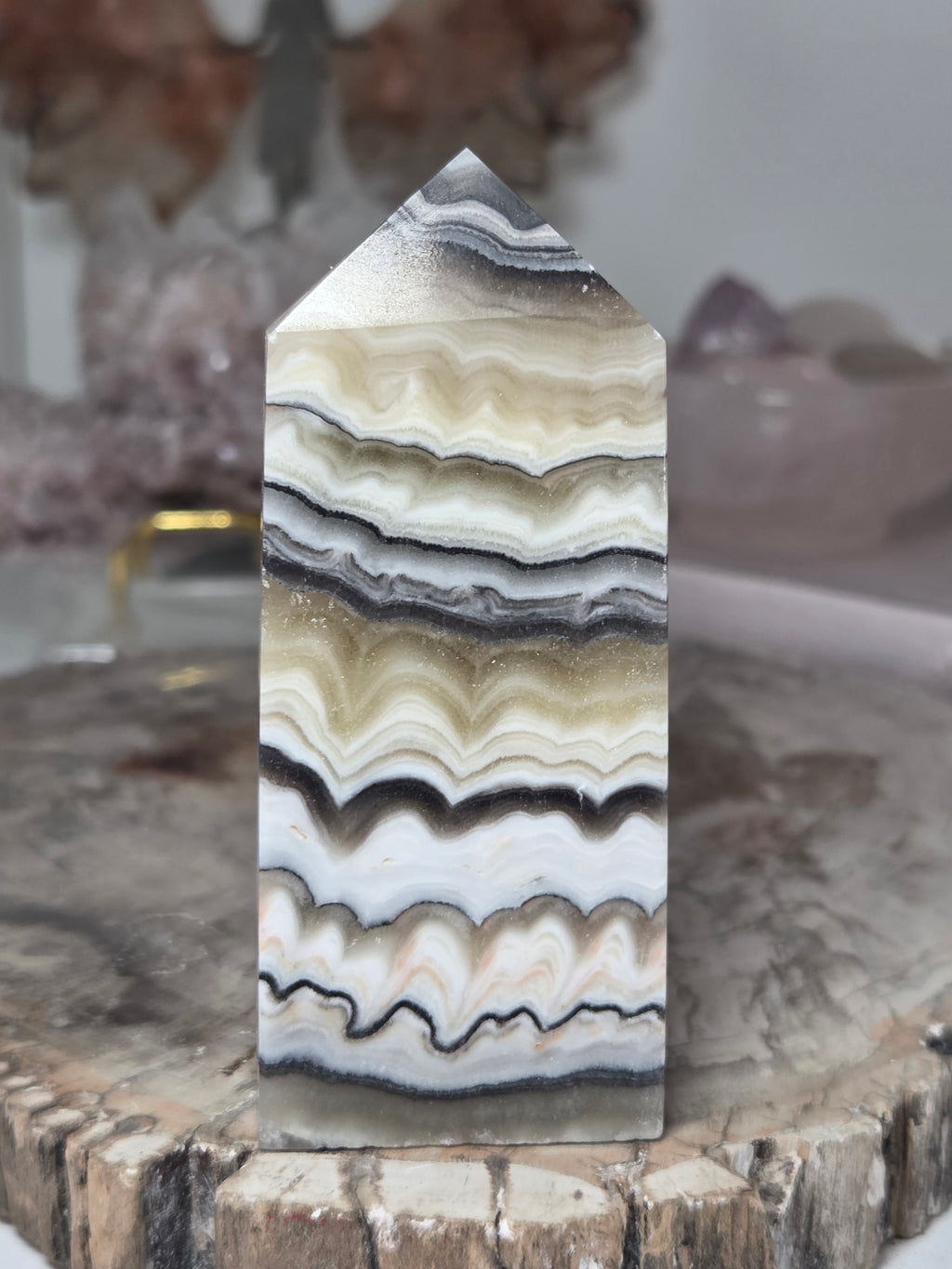 Orange calcite crystal tower