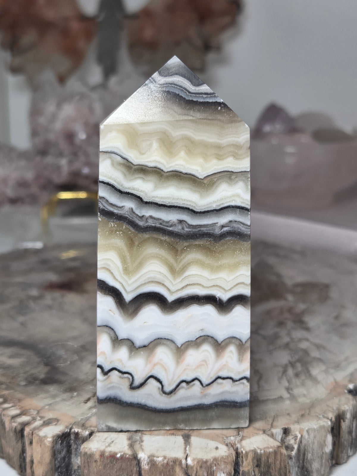 Orange calcite crystal tower