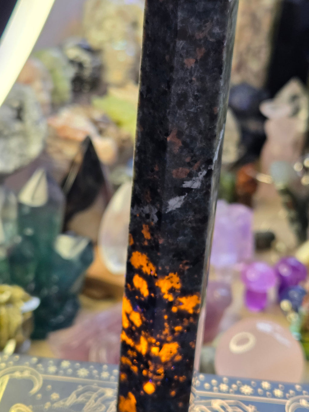 Large Yooperlite crystal tower with orange Uv