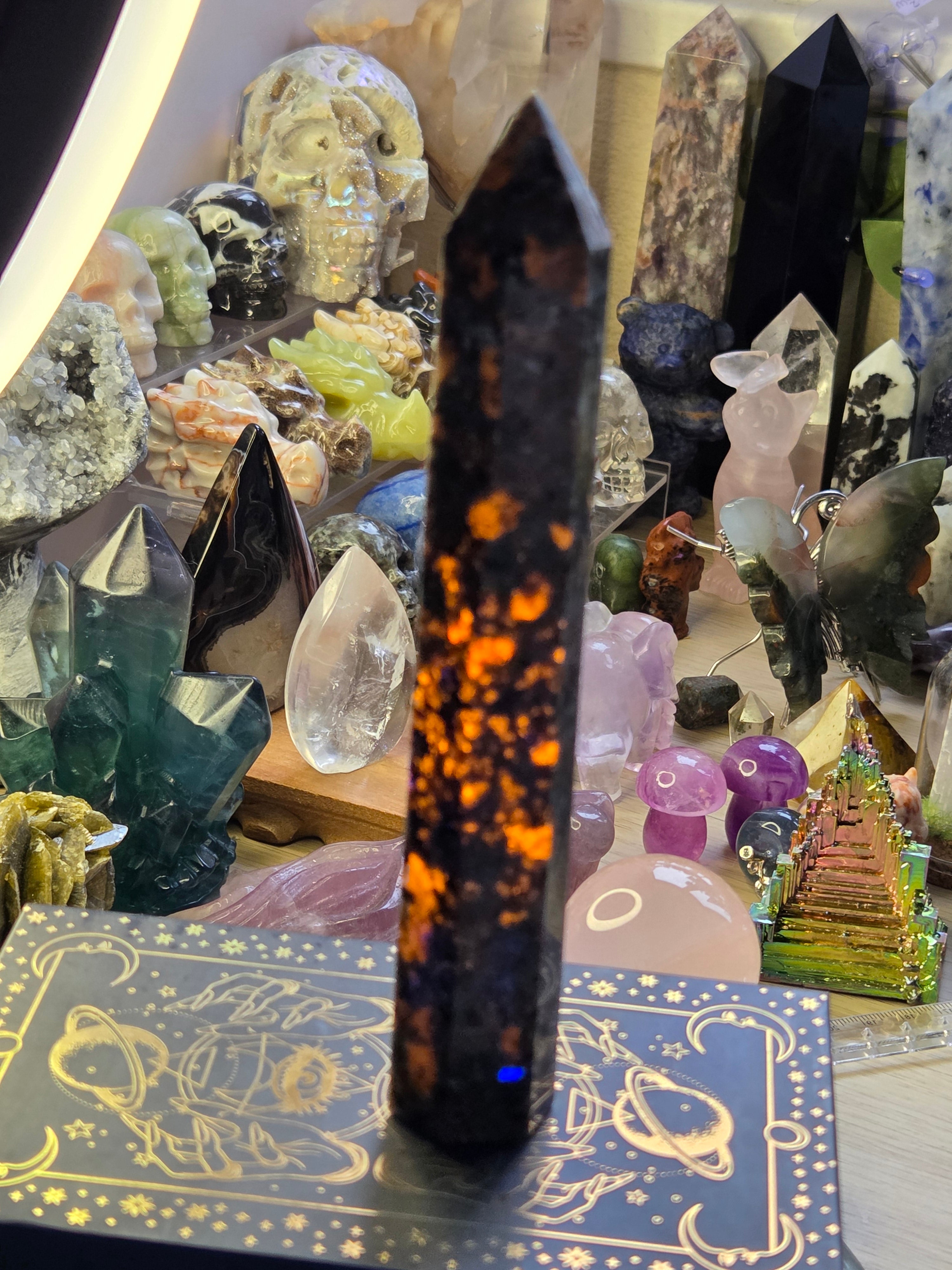 Large Yooperlite crystal tower with orange Uv