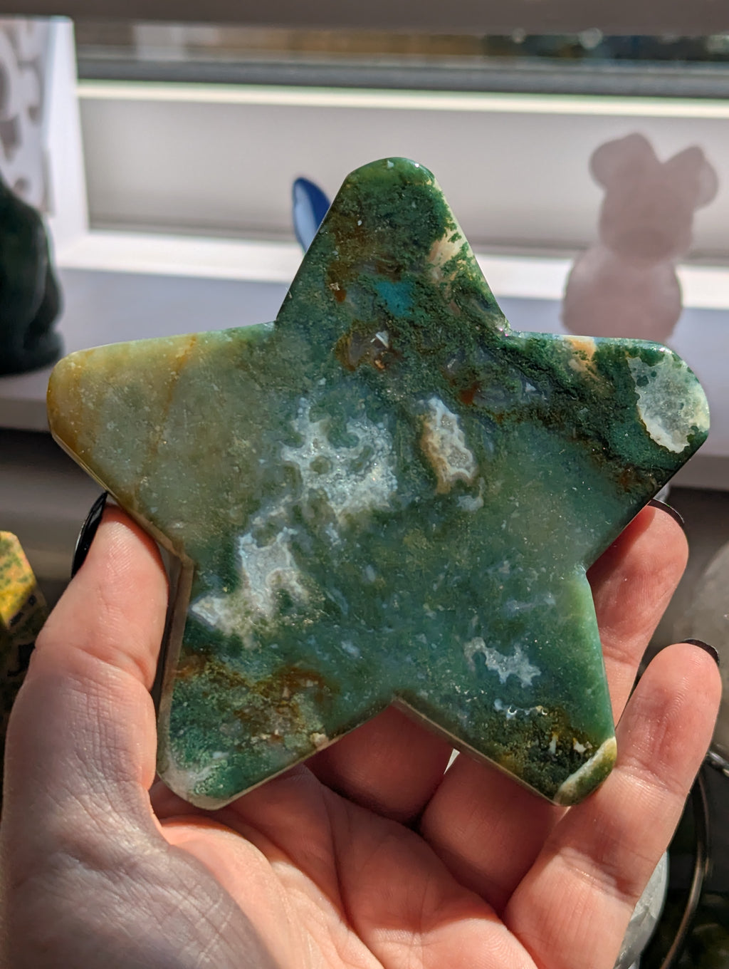 Moss agate crystal star with stand