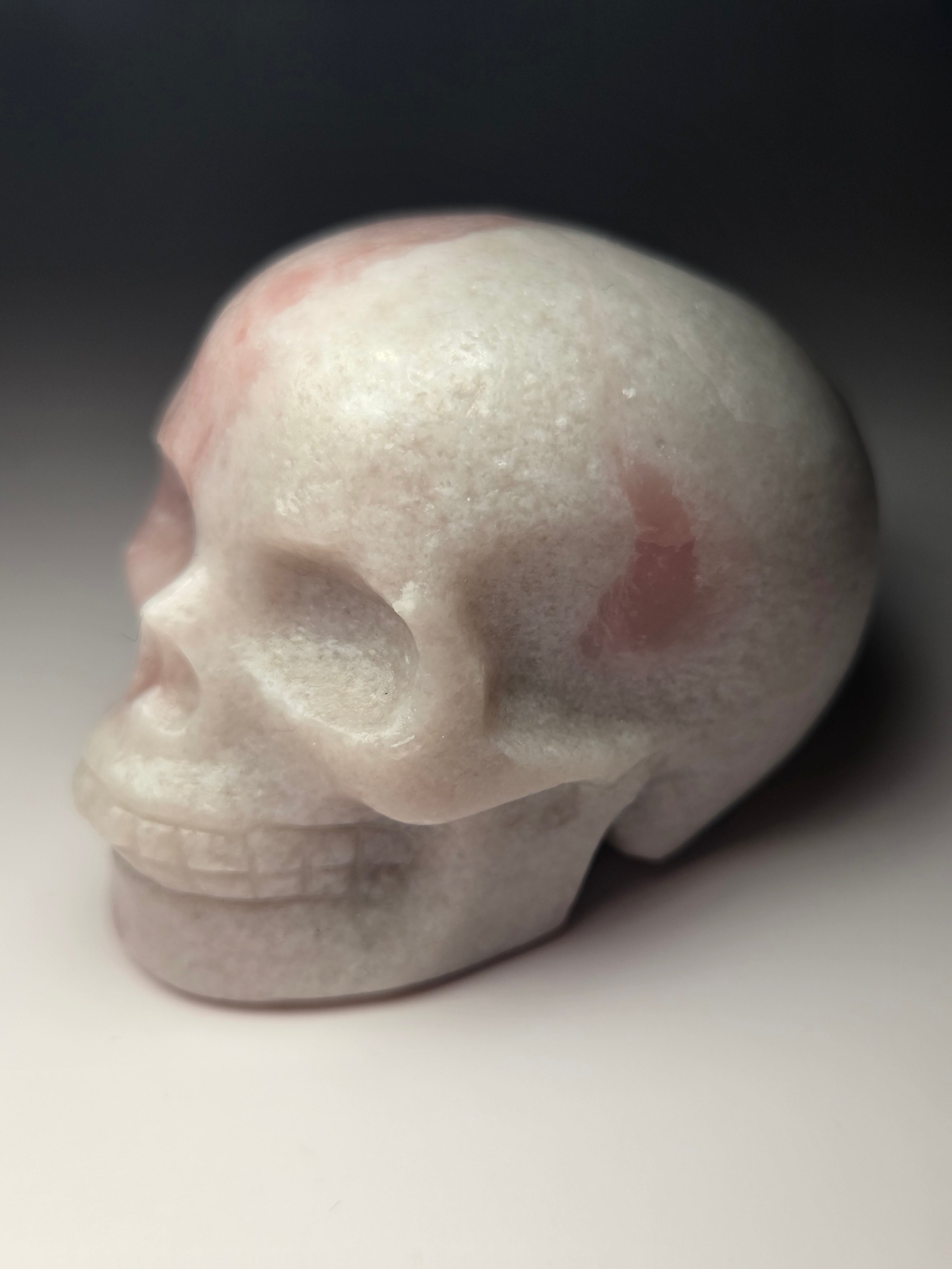 Pink opal  crystal skull carving