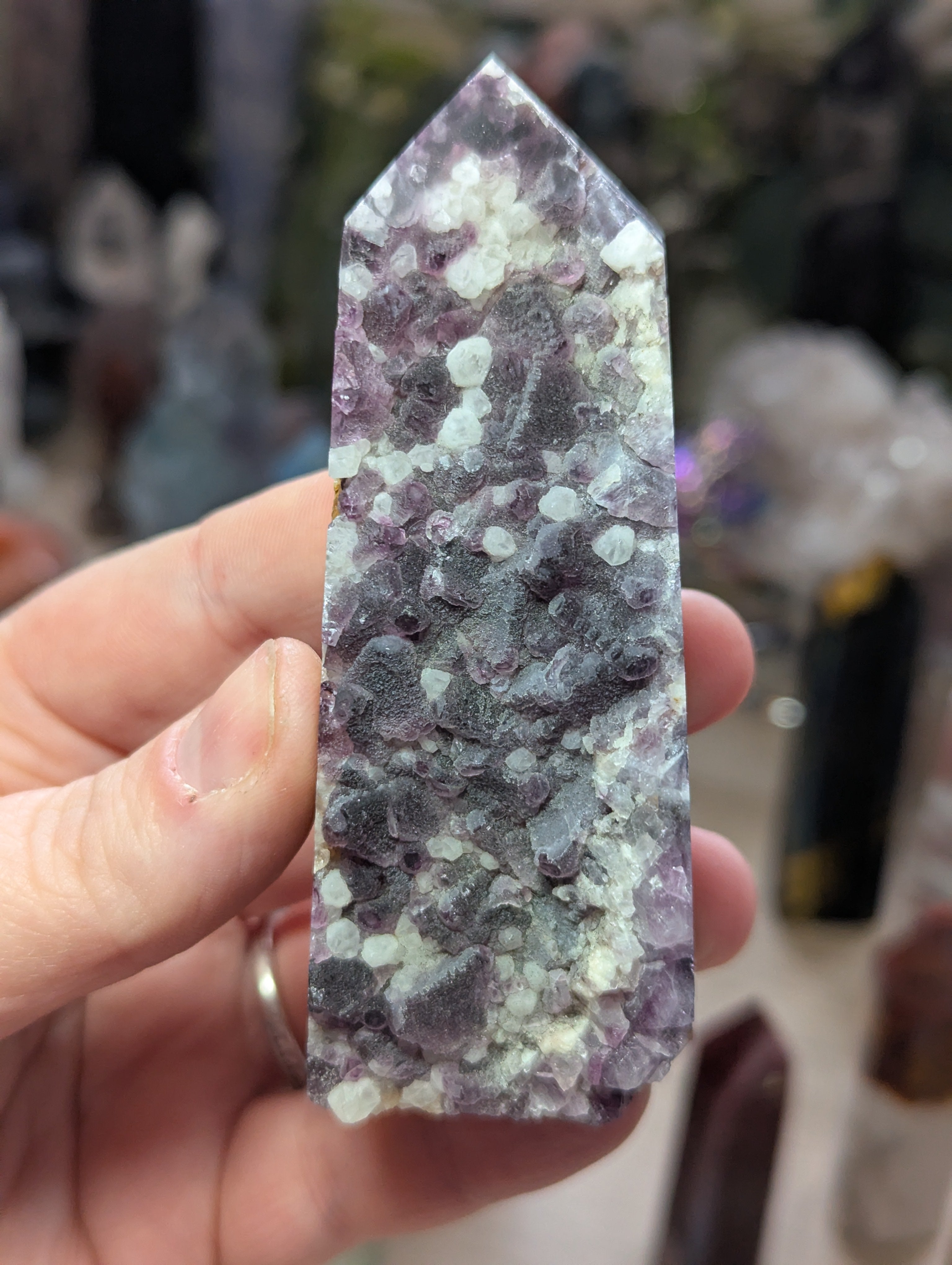 Raw flourite crystal tower carving