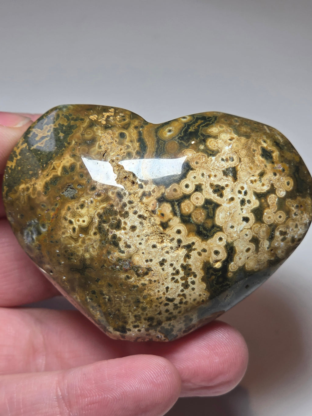 Ocean Jasper crystal heart carving with imperfections