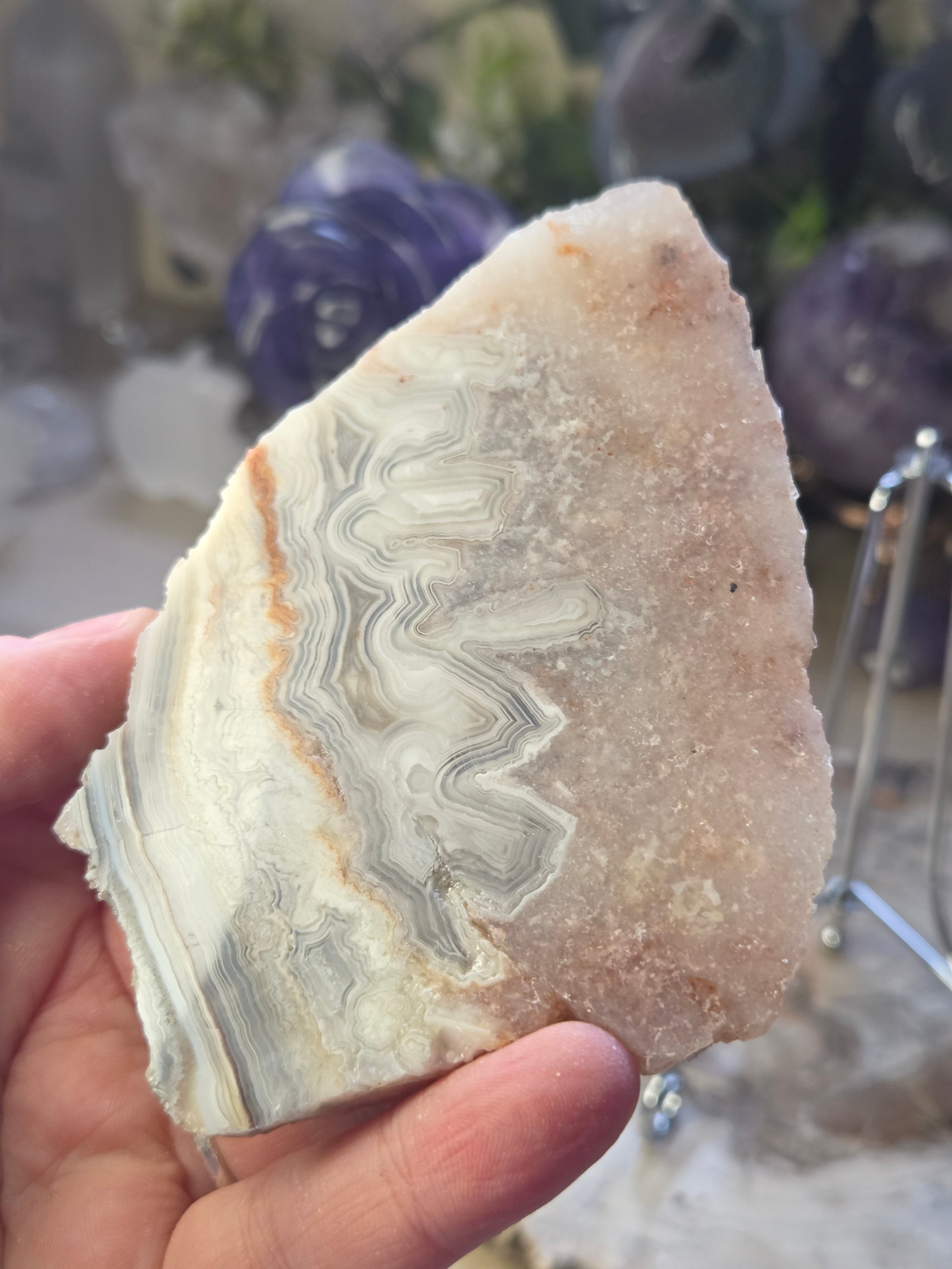 Crazy lace agate crystal slice  with pink amethyst