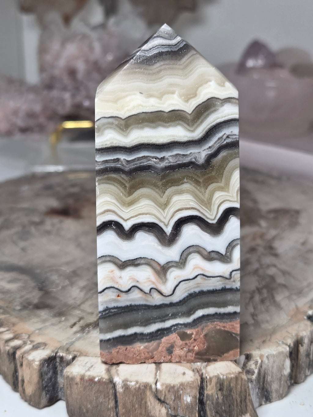 Orange calcite crystal tower