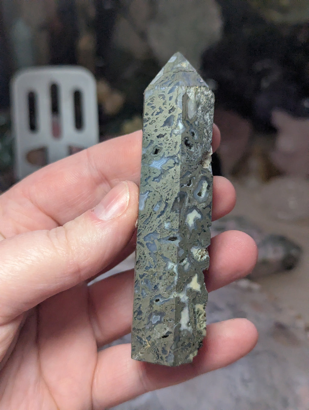 Pyrite crystal tower with agate and has opened natural caves
