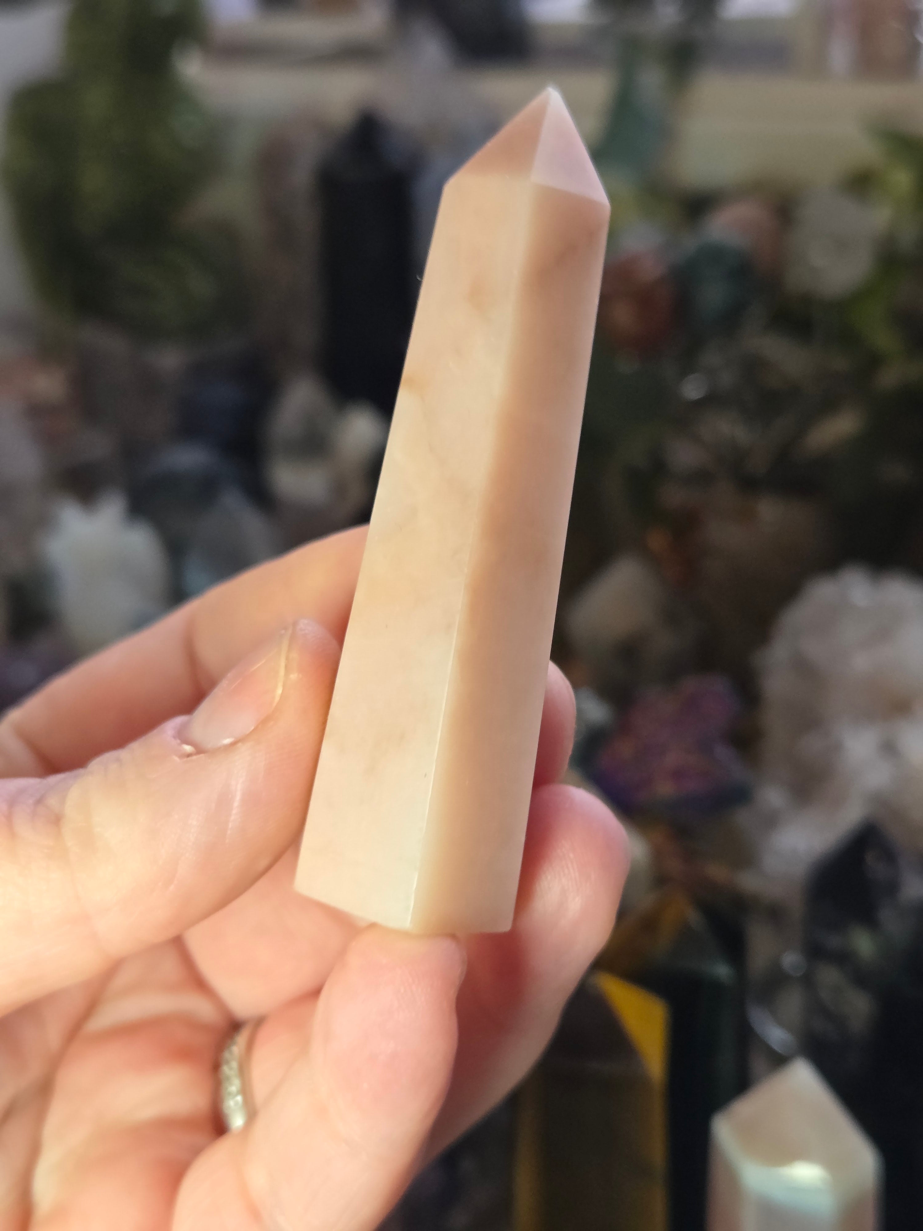 Pink opal crystal tower carving