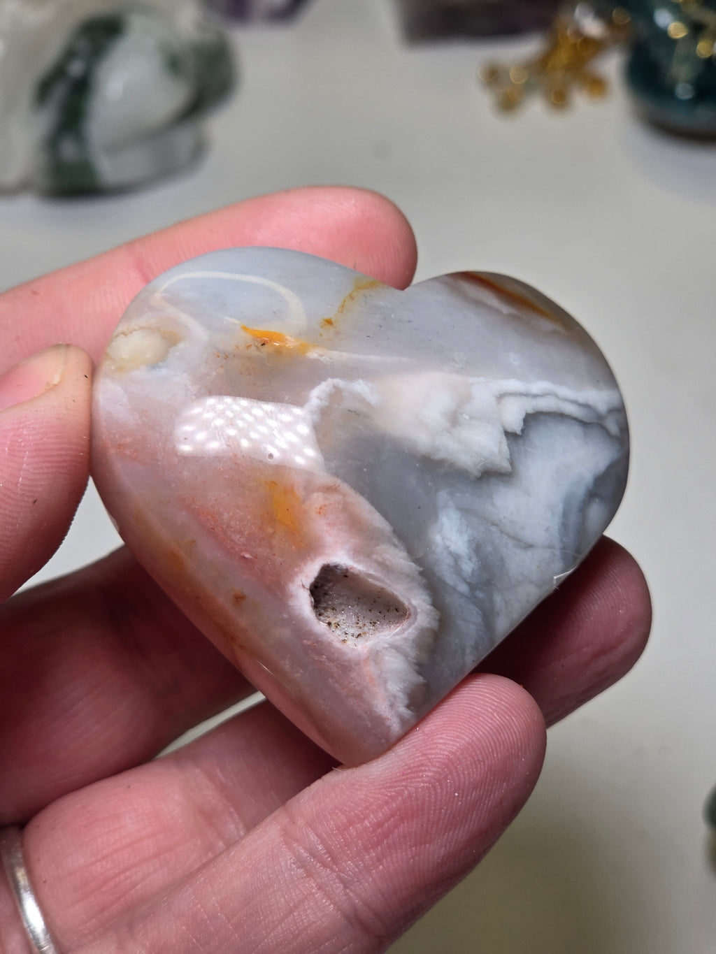 Pink petrified wood crystal heart carving