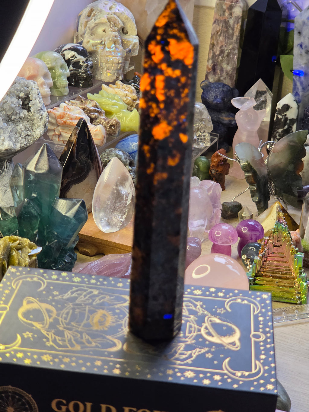 Large Yooperlite crystal tower with orange Uv