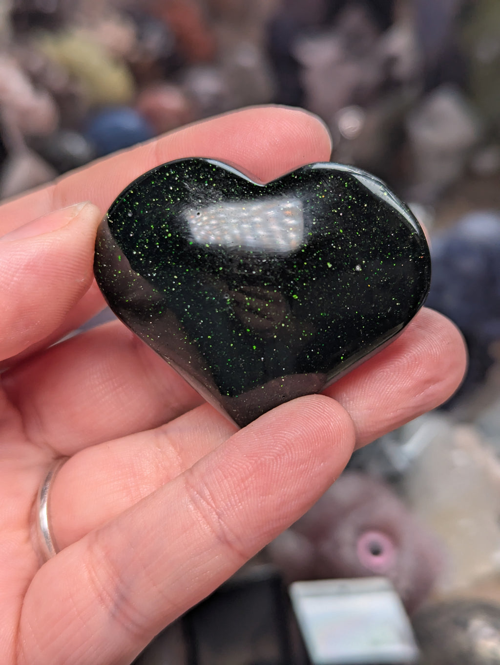 Green sandstone heart carving