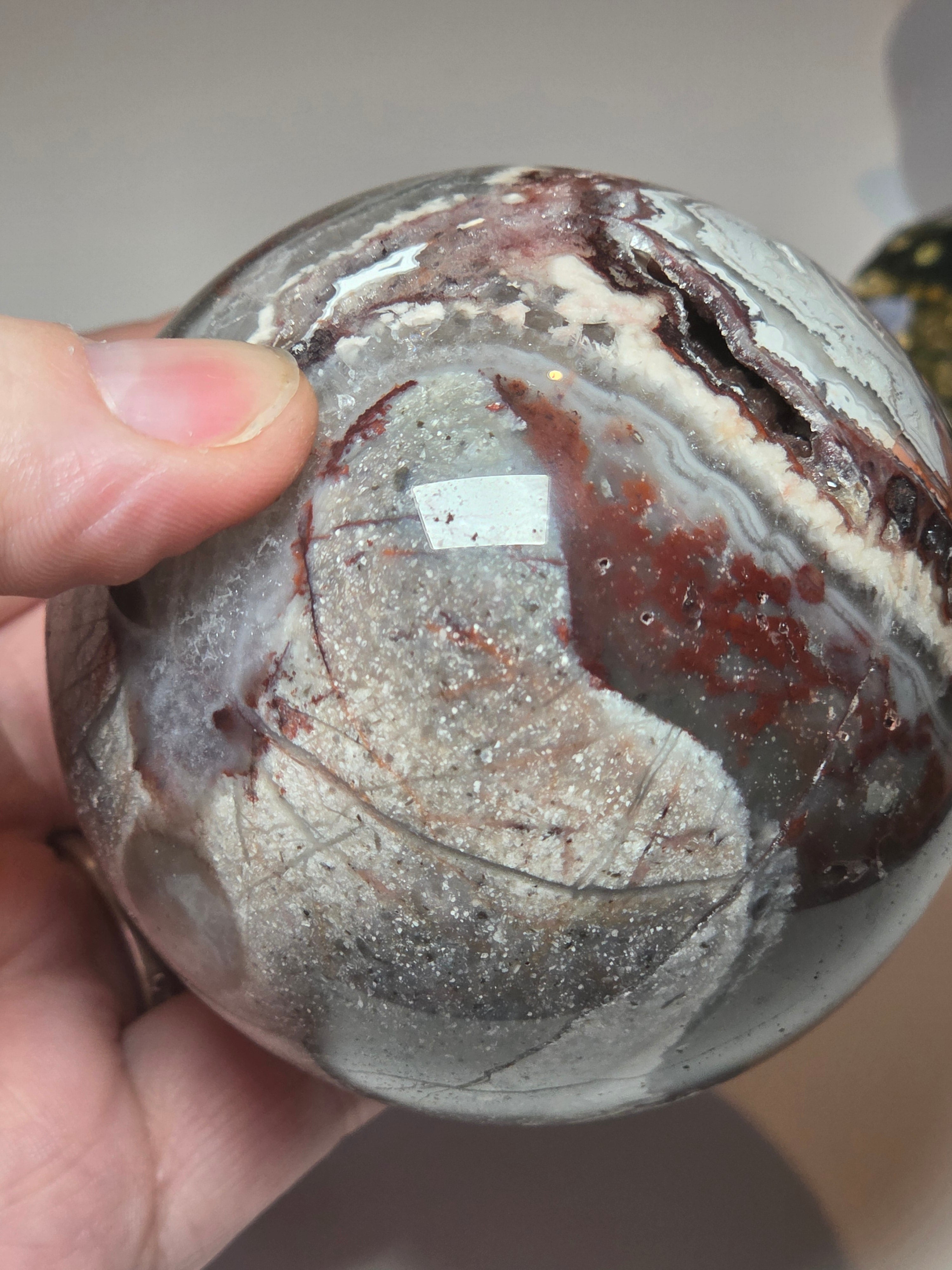 Mexican crazy lace agate crystal sphere  with imperfections