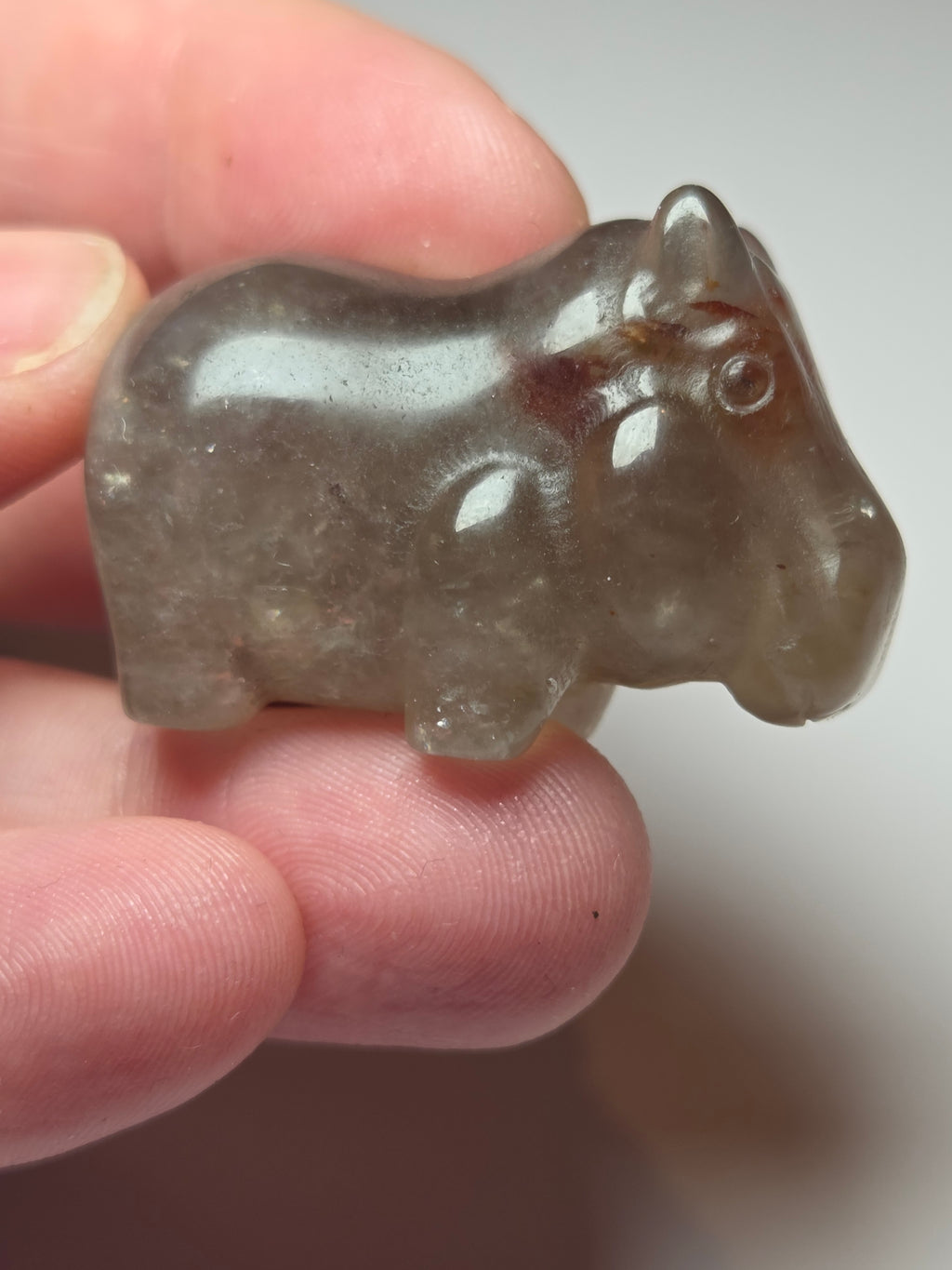Fire quartz crystal hippo carving