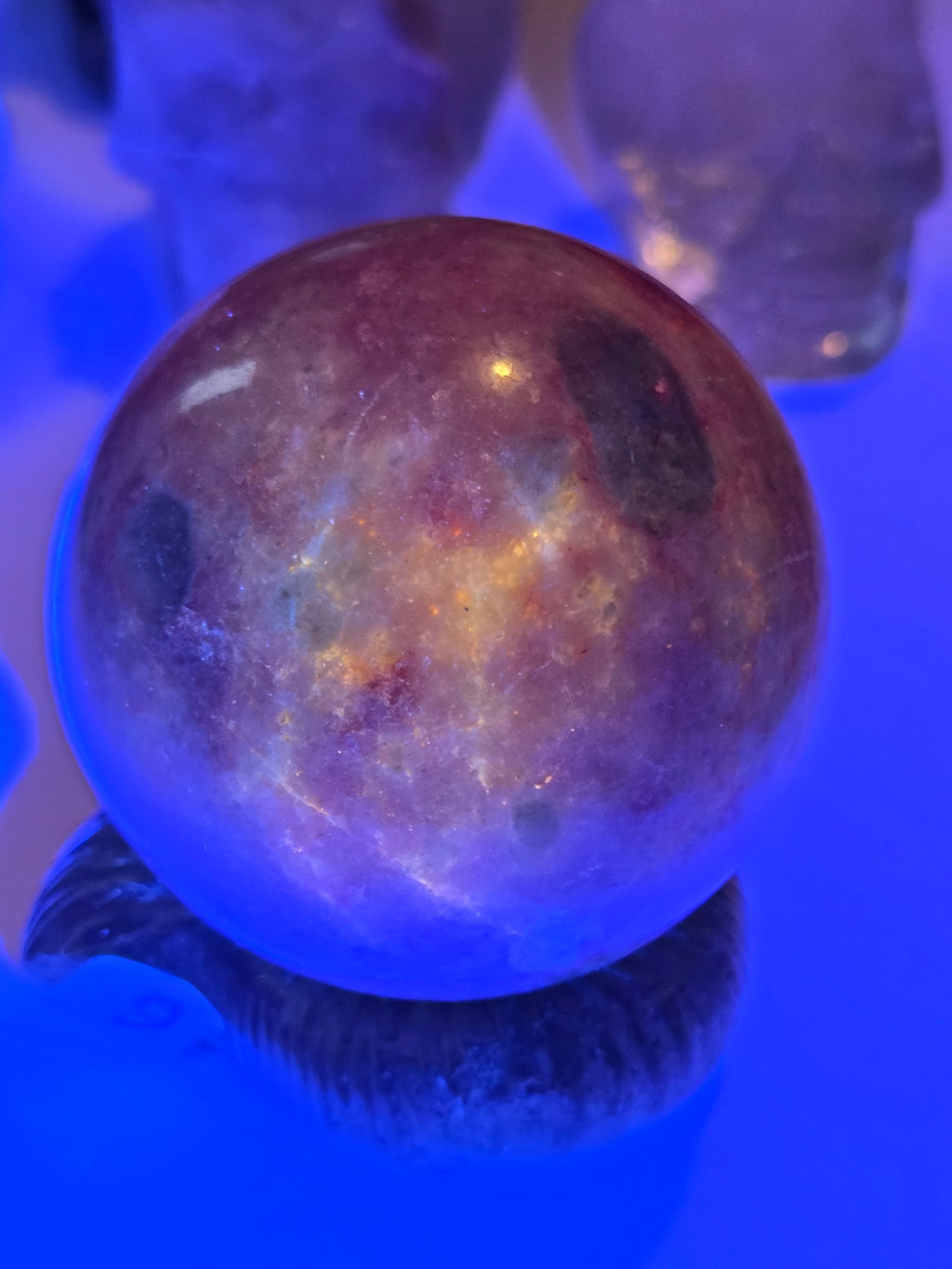 Pink zoisite crystal sphere carving with UV and comes with Stand