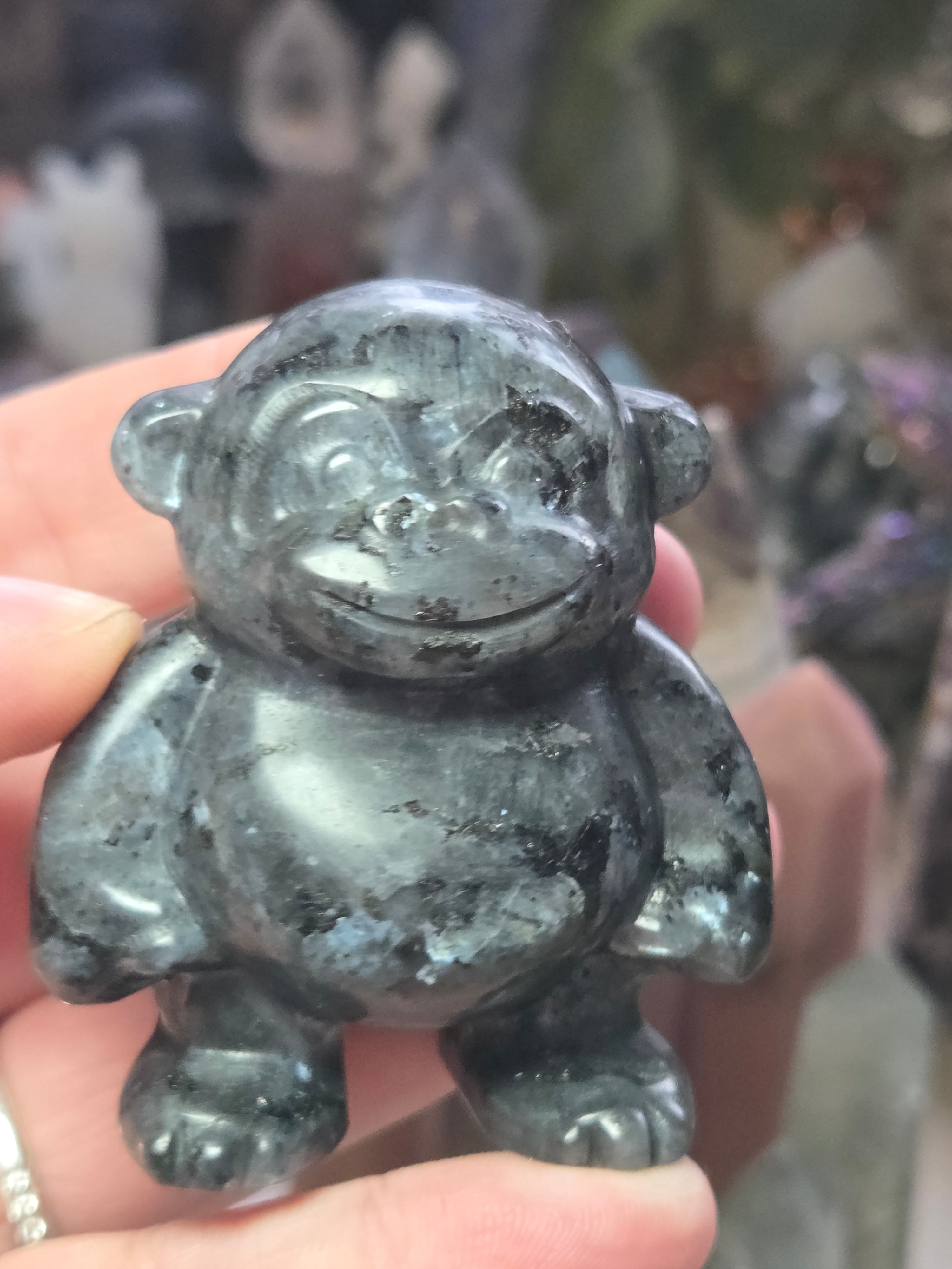 Larvakite crystal monkey carving