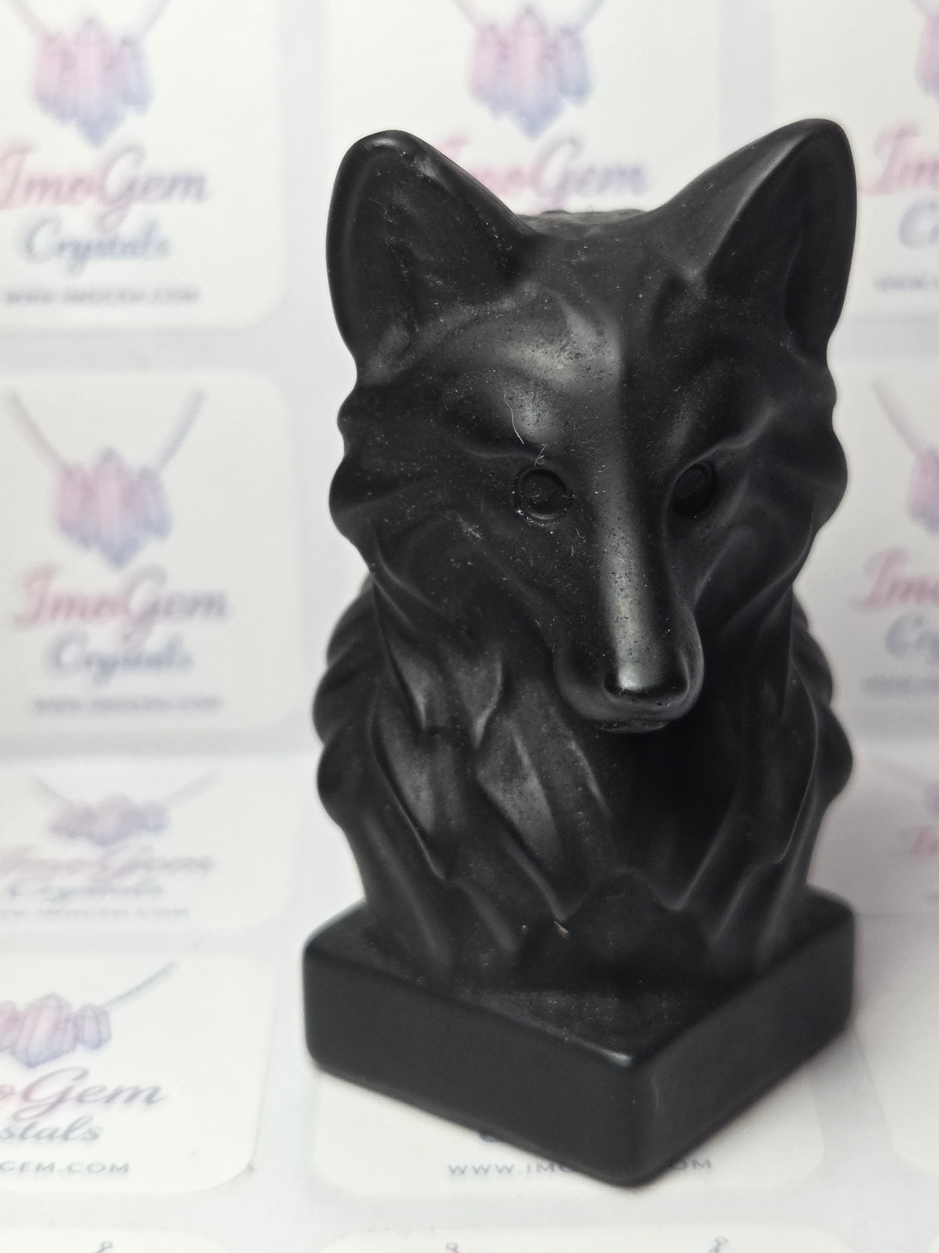 Obsidian crystal wolf head carving