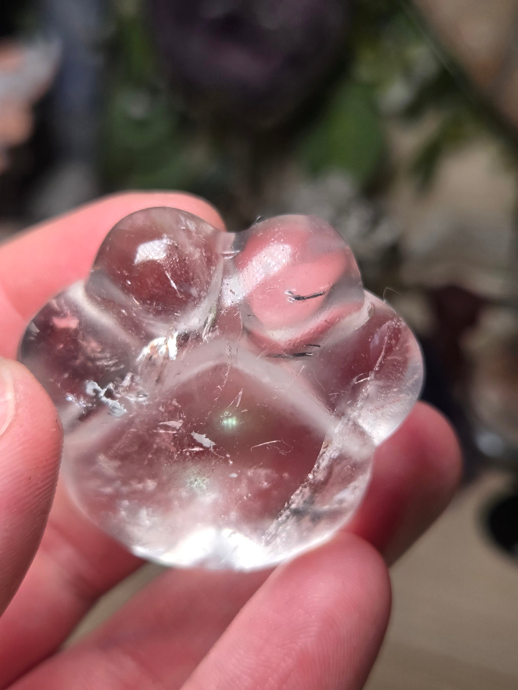 Clear quartz crystal paw print carving
