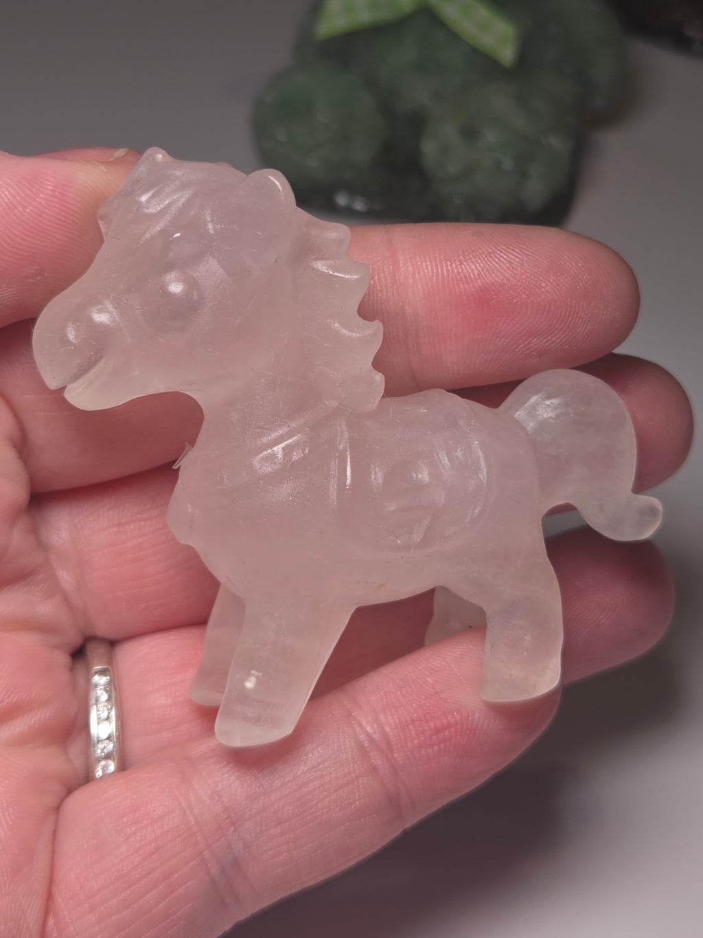 Rose quartz crystal horse carving