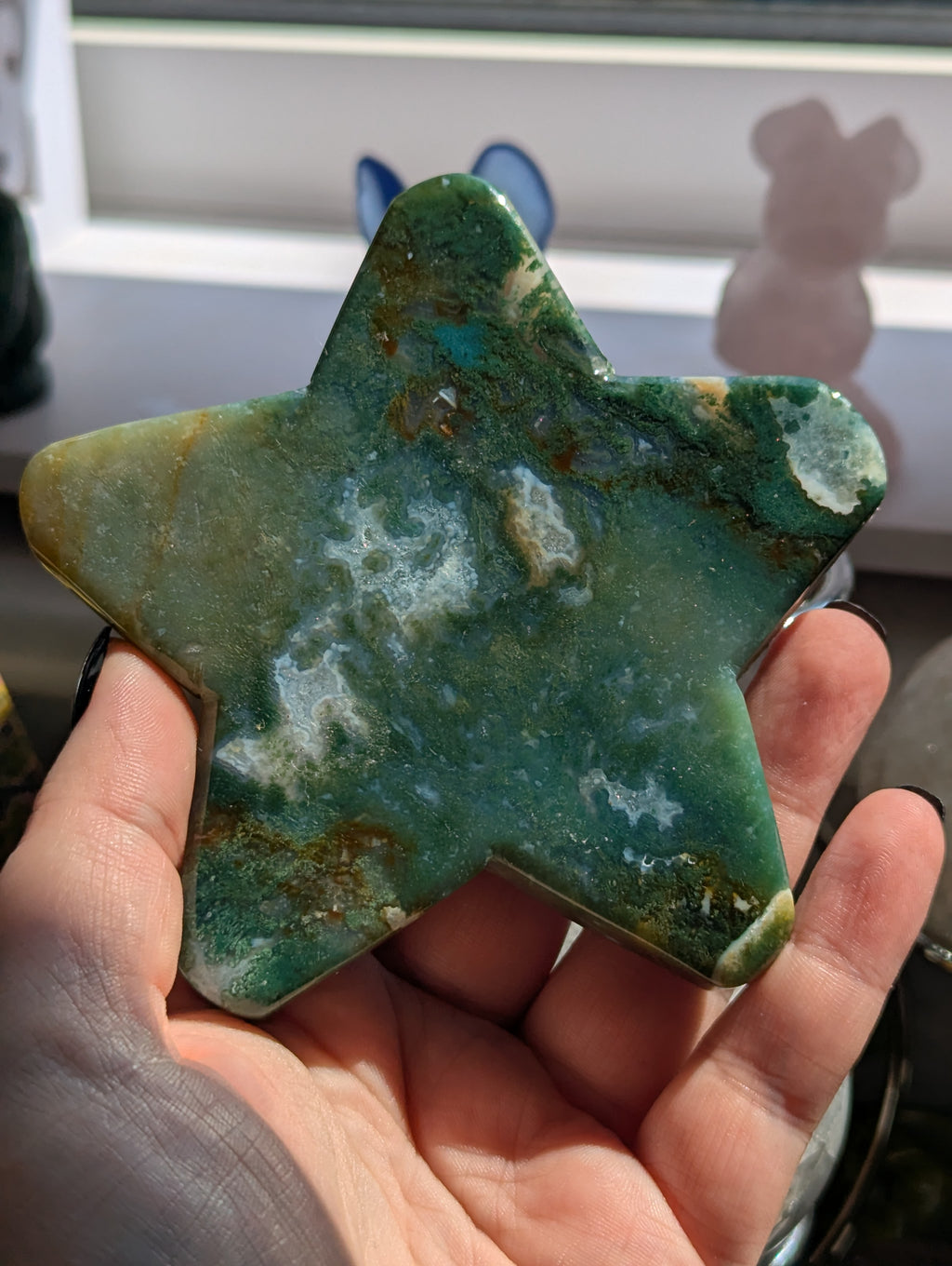 Moss agate crystal star with stand