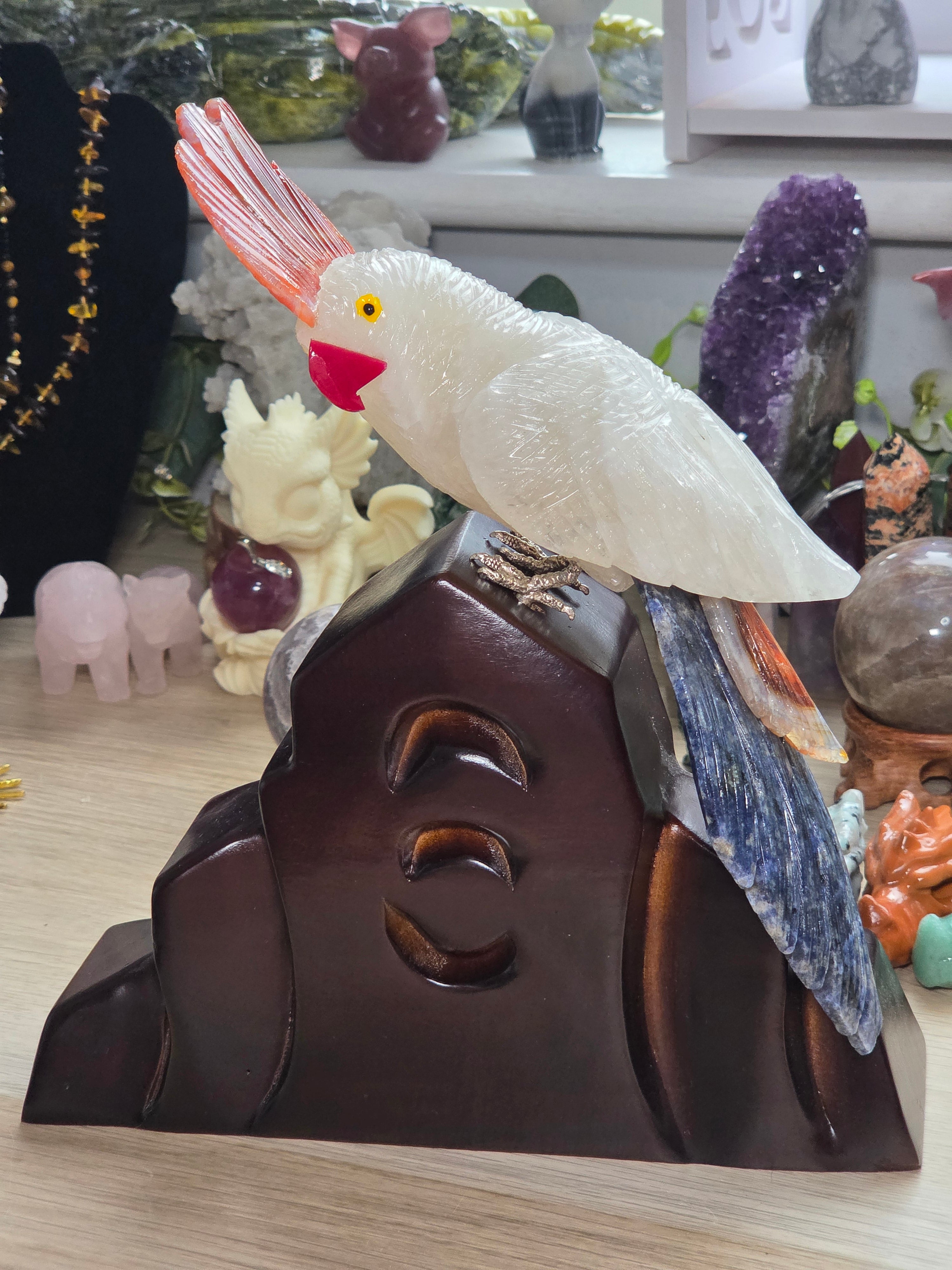 Amazing clear quartz crystal parrot with red agate and sodalite with custom stand