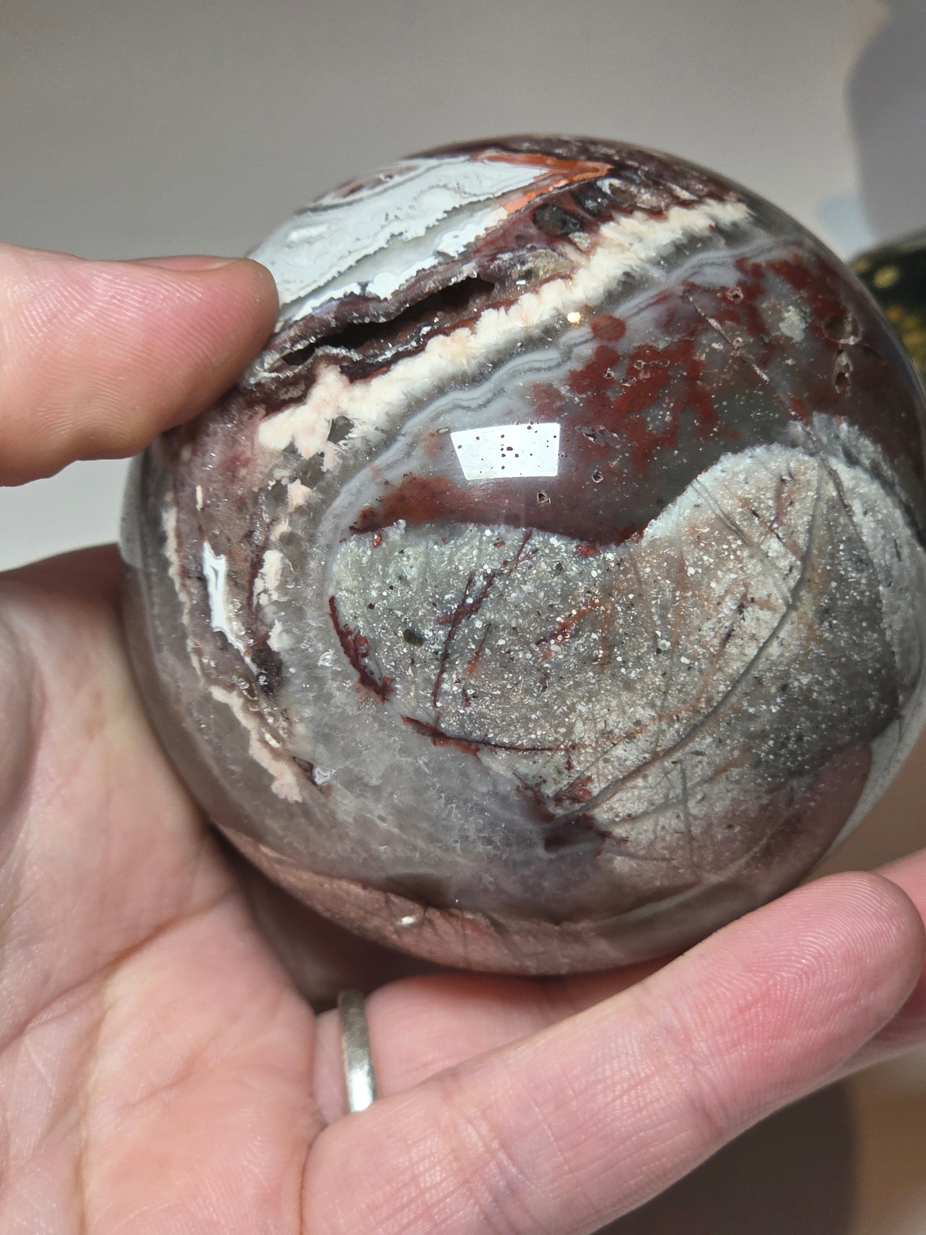 Mexican crazy lace agate crystal sphere  with imperfections