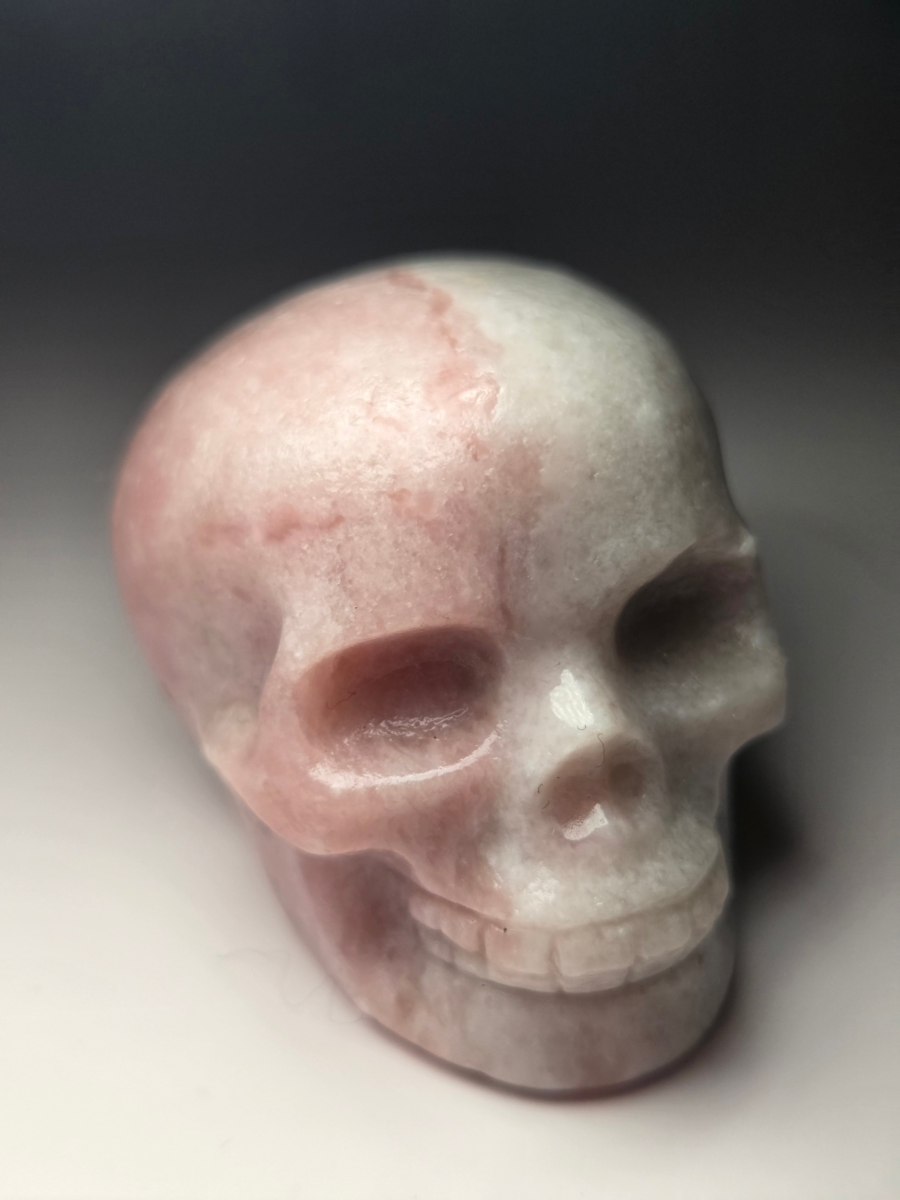 Pink opal  crystal skull carving