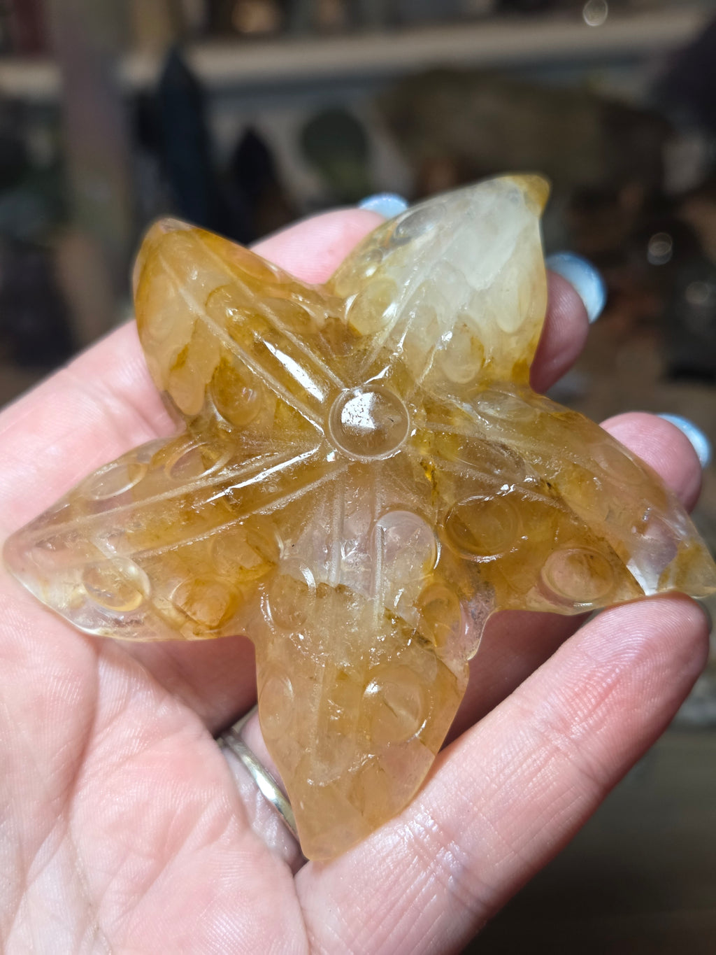 Golden healer star fish carving