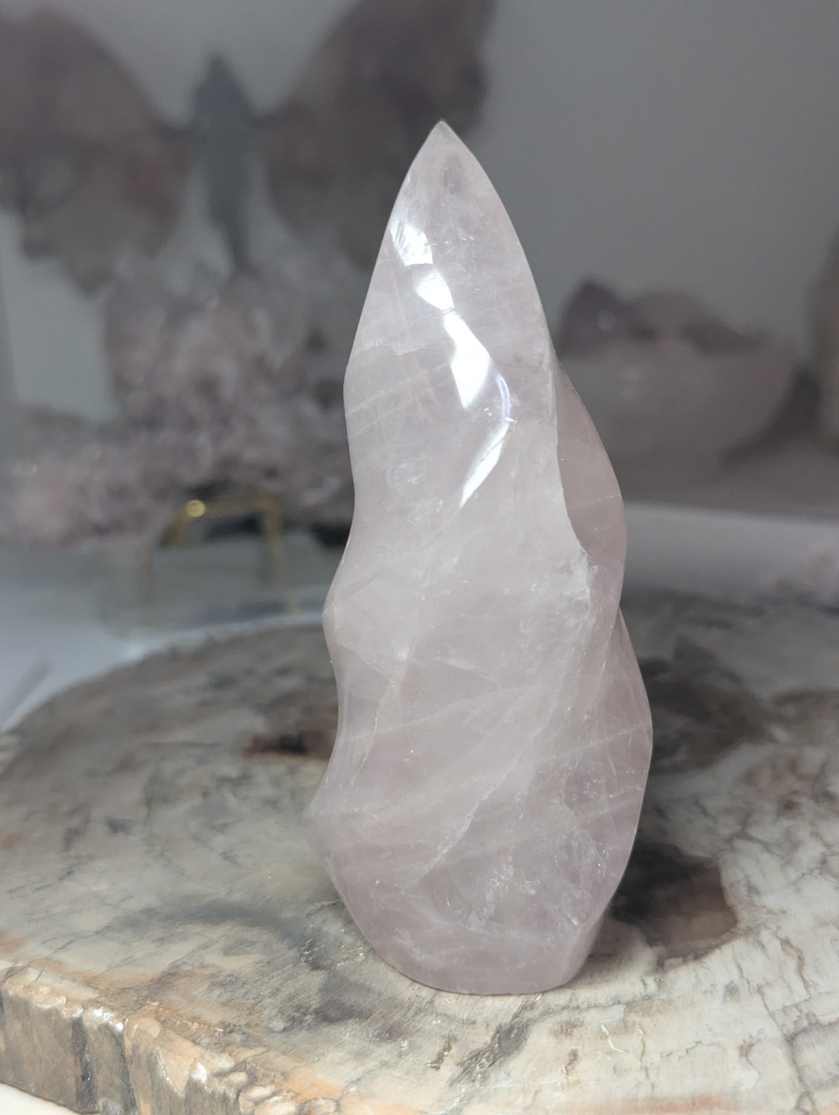 Rose quartz crystal flame carving