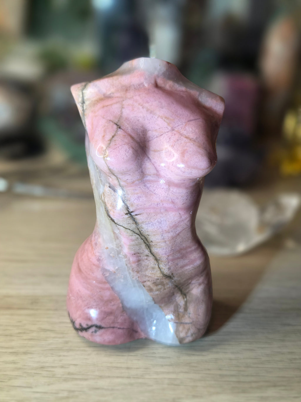 Rhodonite crystal female body carving