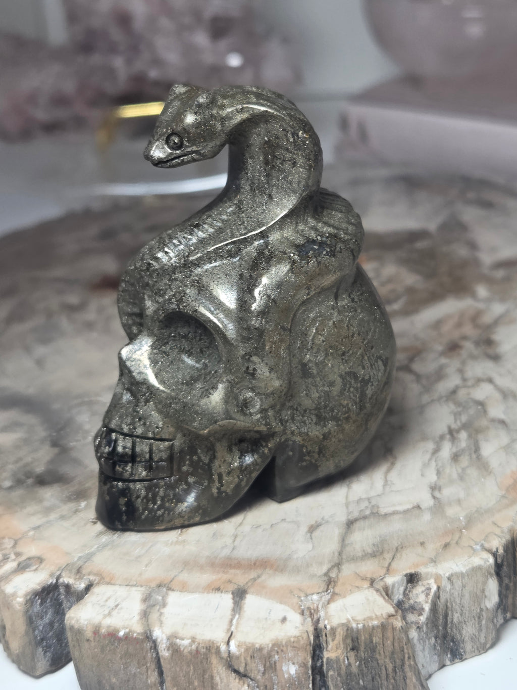 Pyrite crystal skull with Snake carving